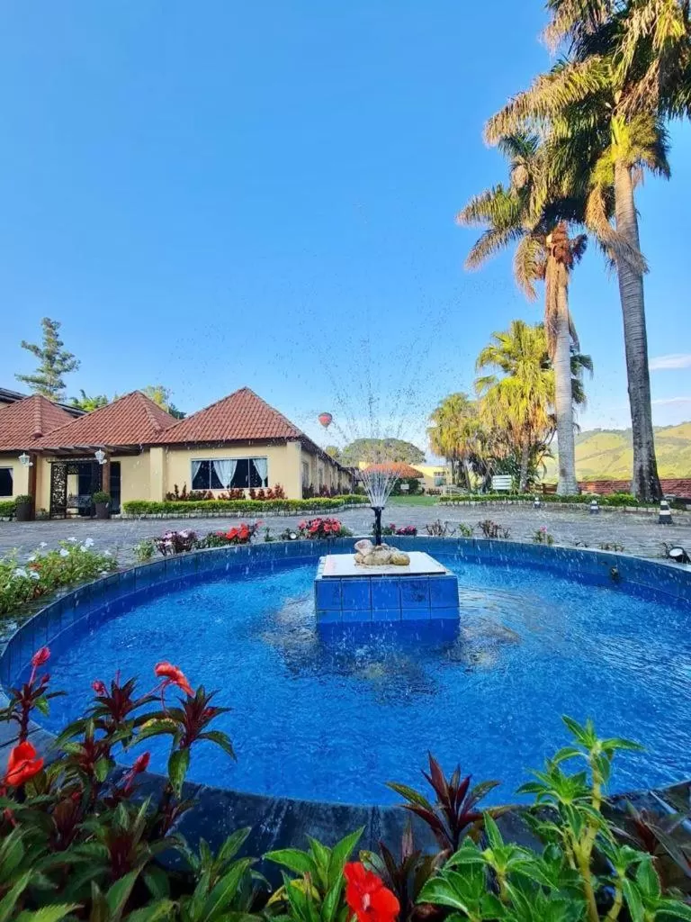 Property building, Swimming Pool in Pousada Le Sapê