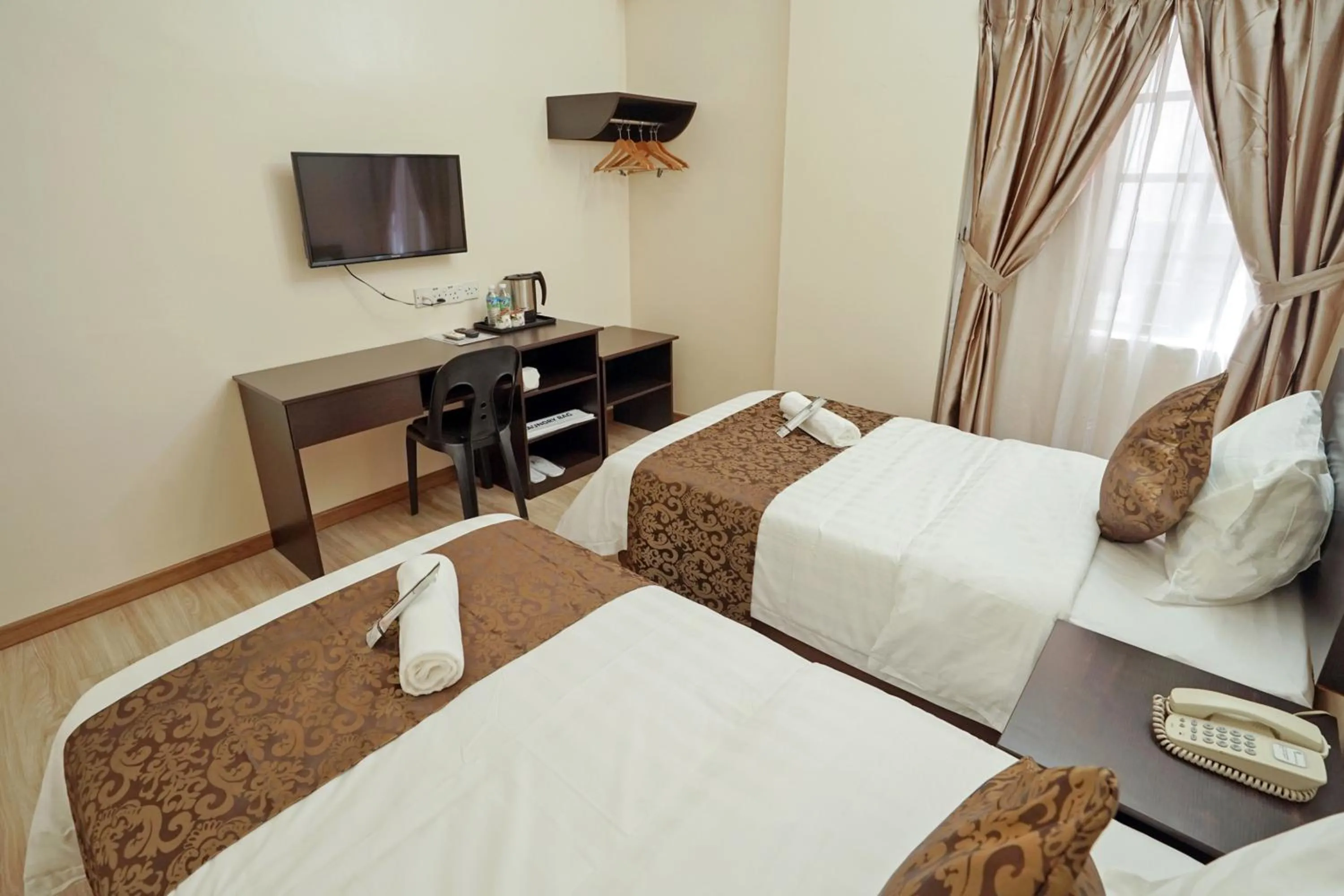 Photo of the whole room, Bed in RJ Hotel Kulai