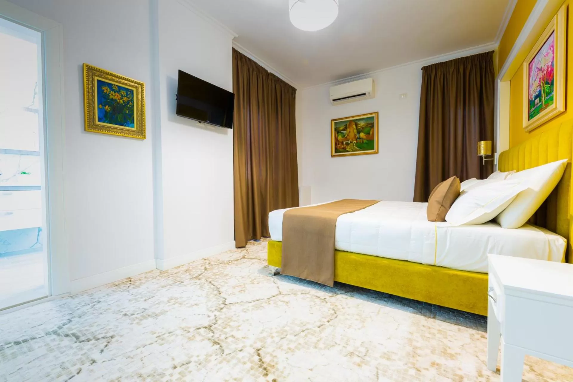 Bed in ART Hotel Tirana