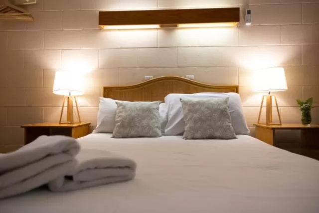 Bed in Tallow Beach Motel