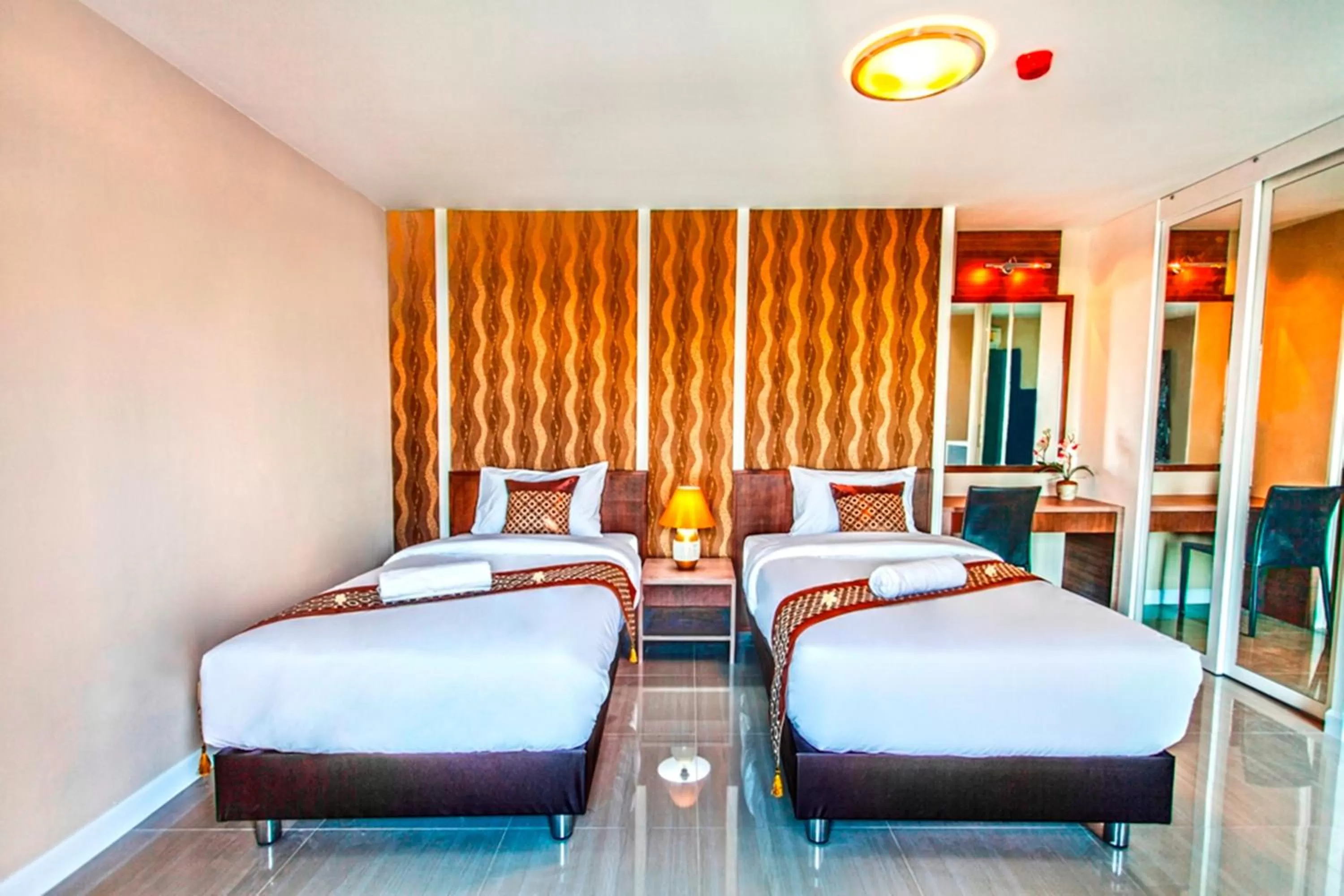 Photo of the whole room, Bed in The Aim Sathorn Hotel