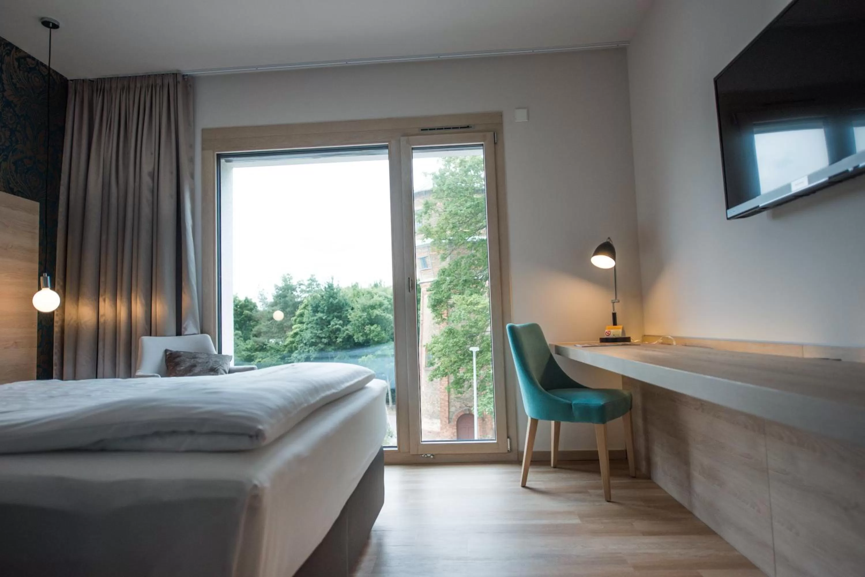 Photo of the whole room, Bed in Parkhotel Schillerhain