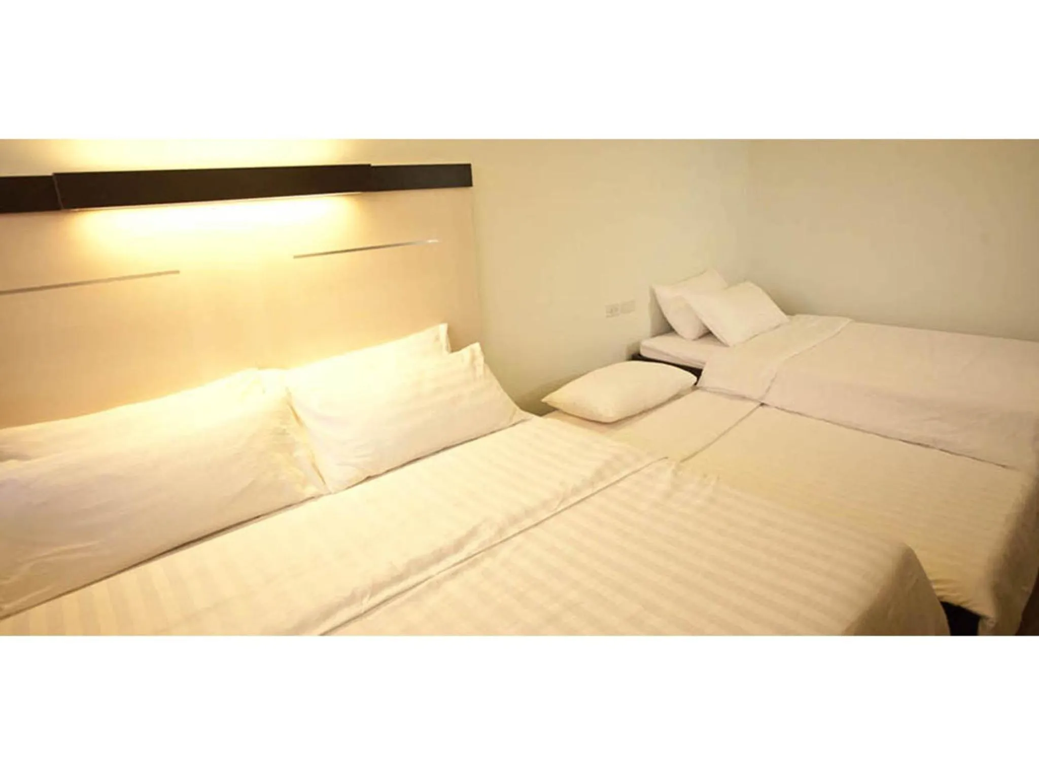 Bed in Sugbutel Family Hotel Cebu powered by Cocotel
