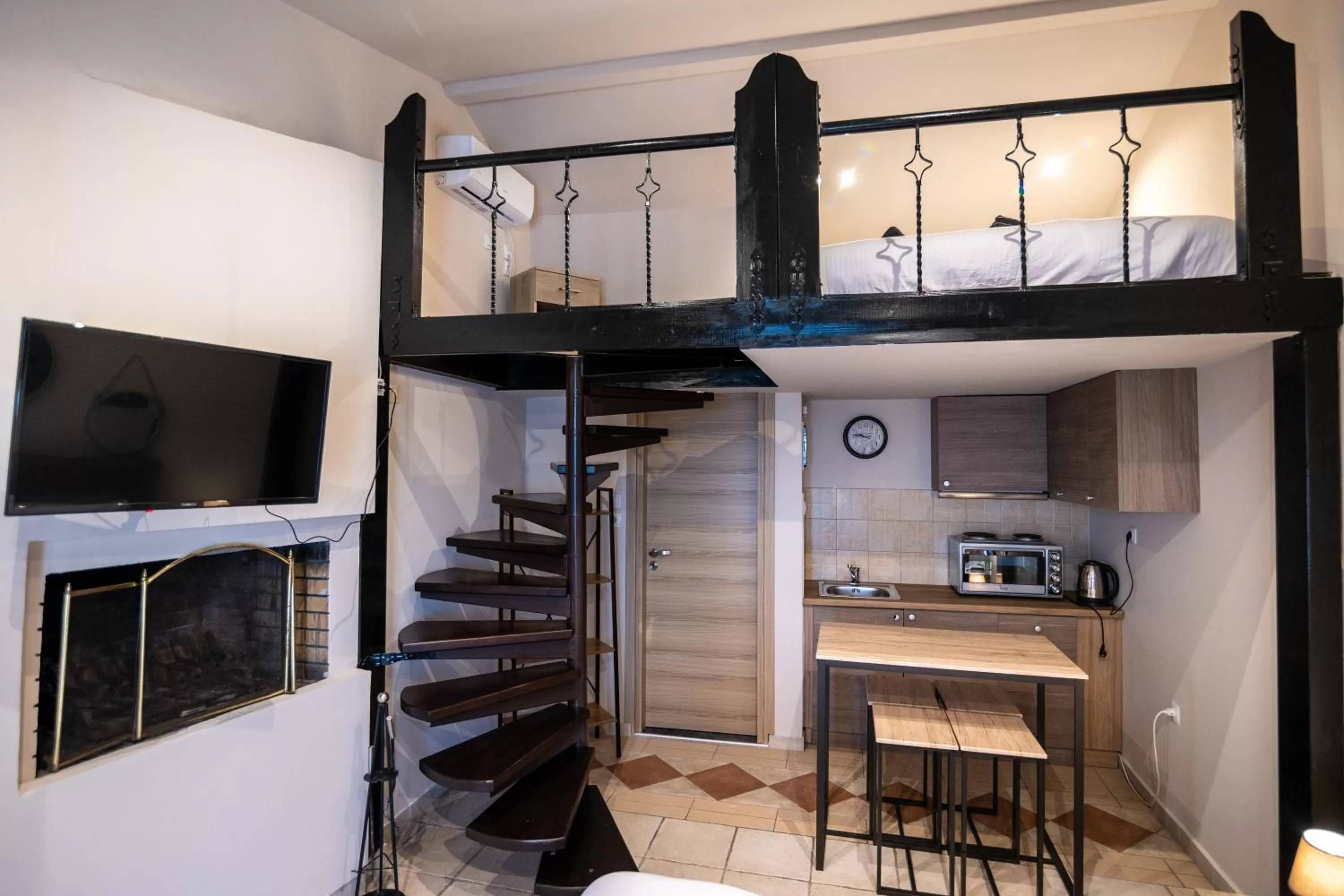 Kitchen or kitchenette in Votsalakia Hotel & Luxury Apartments