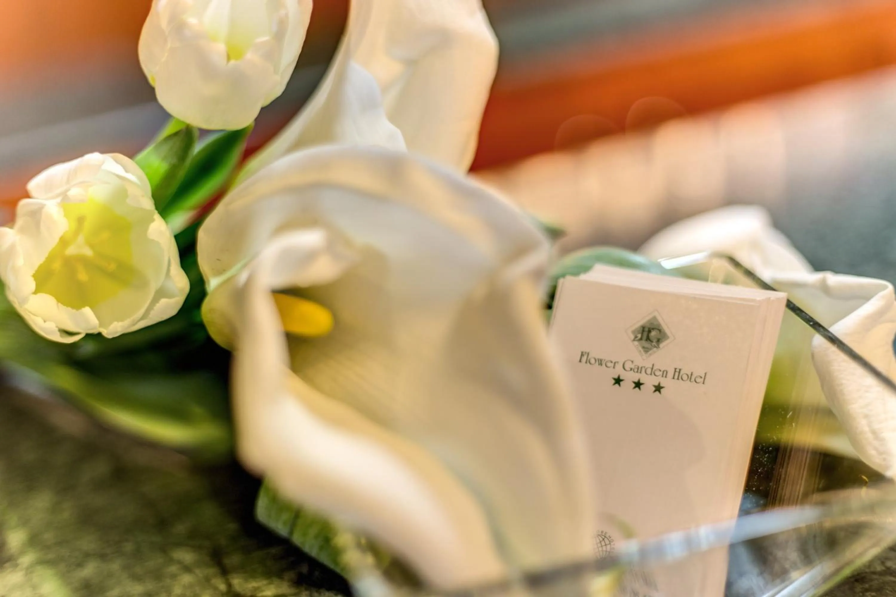 Property logo or sign in Flower Garden Hotel