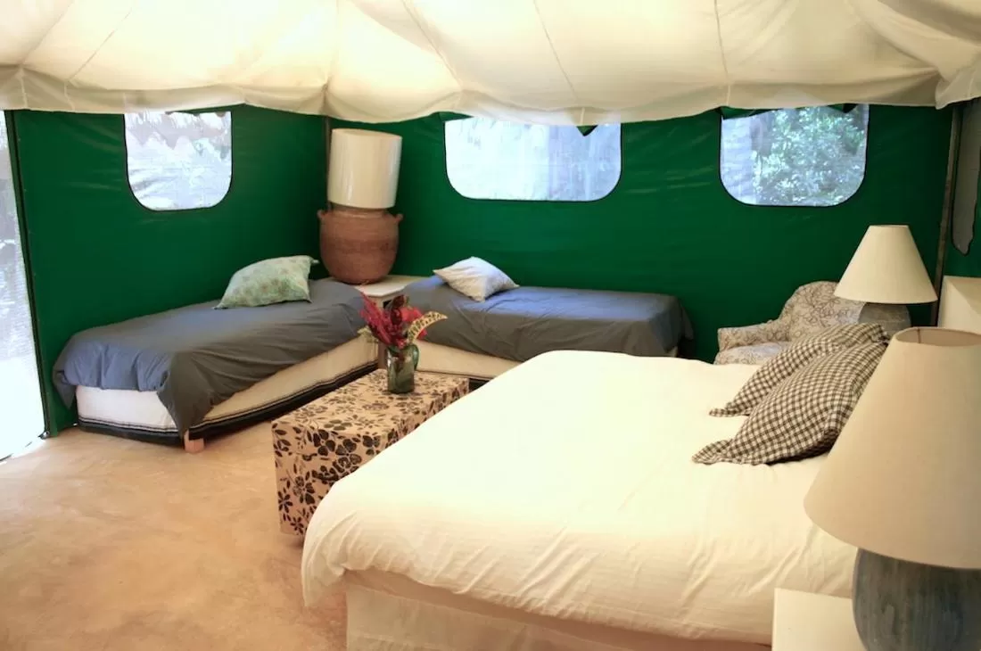 Bed in Junto al Rio Bungalows & Suites