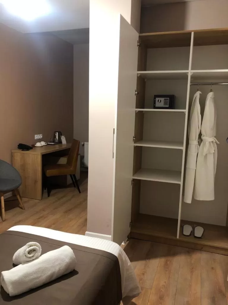 wardrobe, Bed in Boho Tiflis Hotel