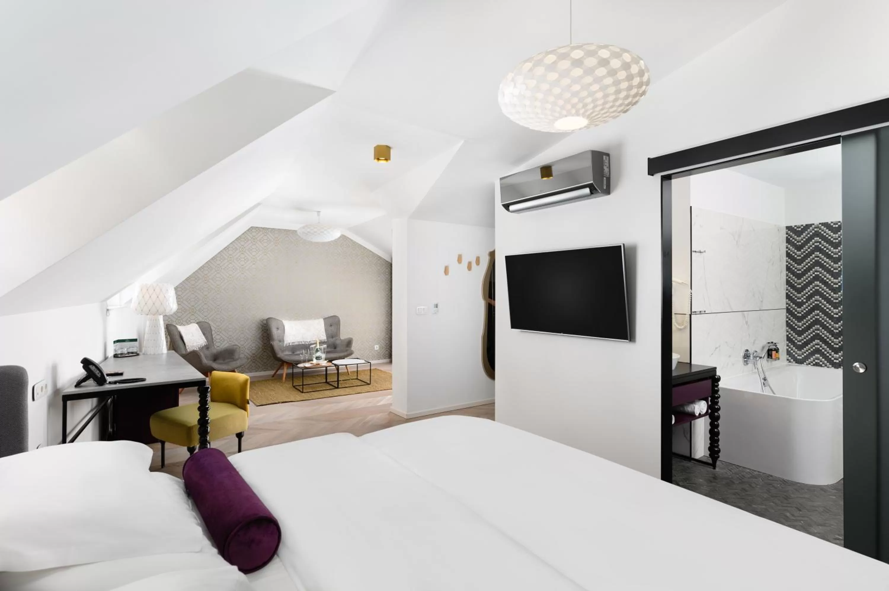 Bed in Maison Bistro & Hotel