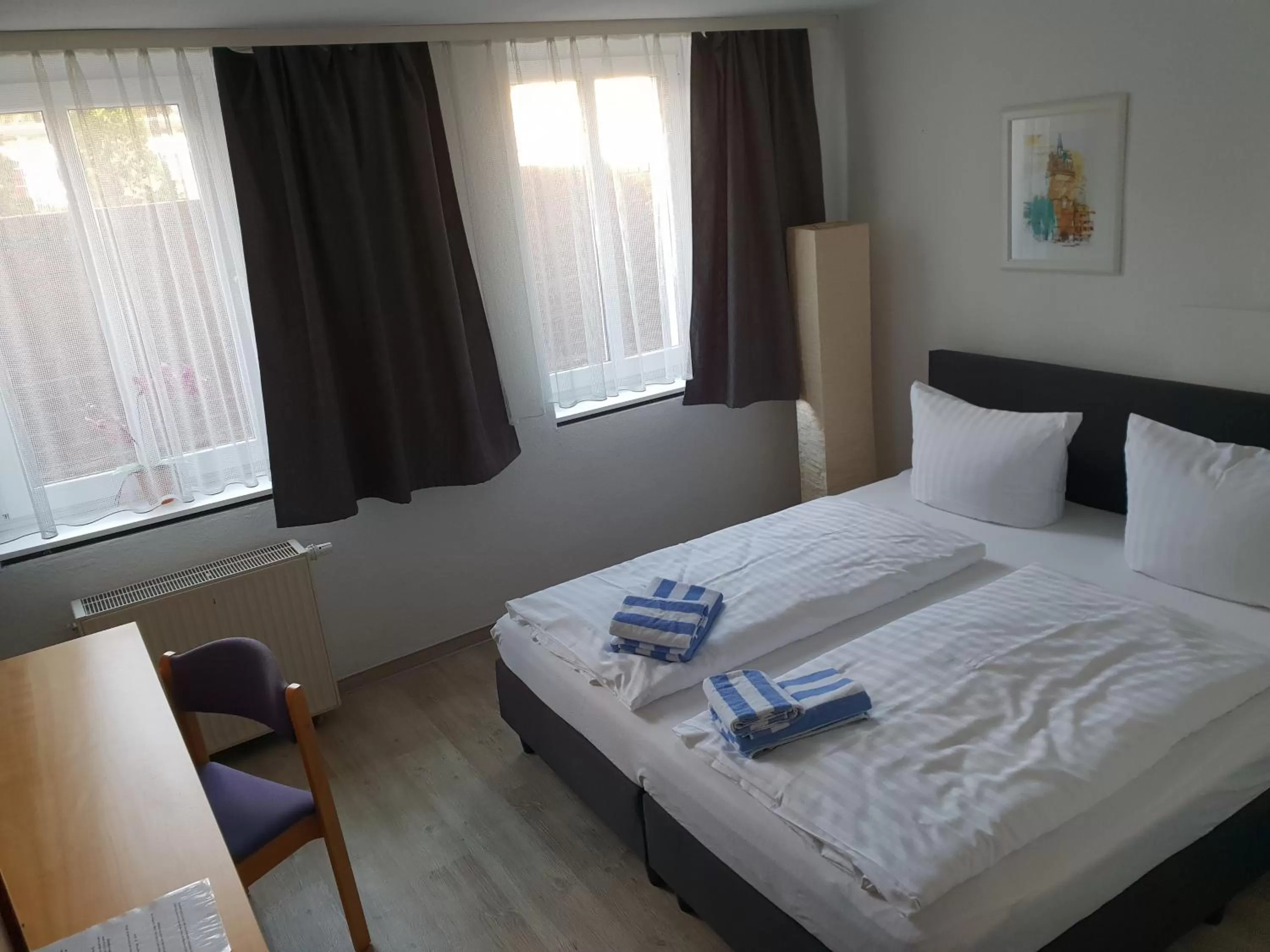 Bed in Appartement-Hotel Rostock