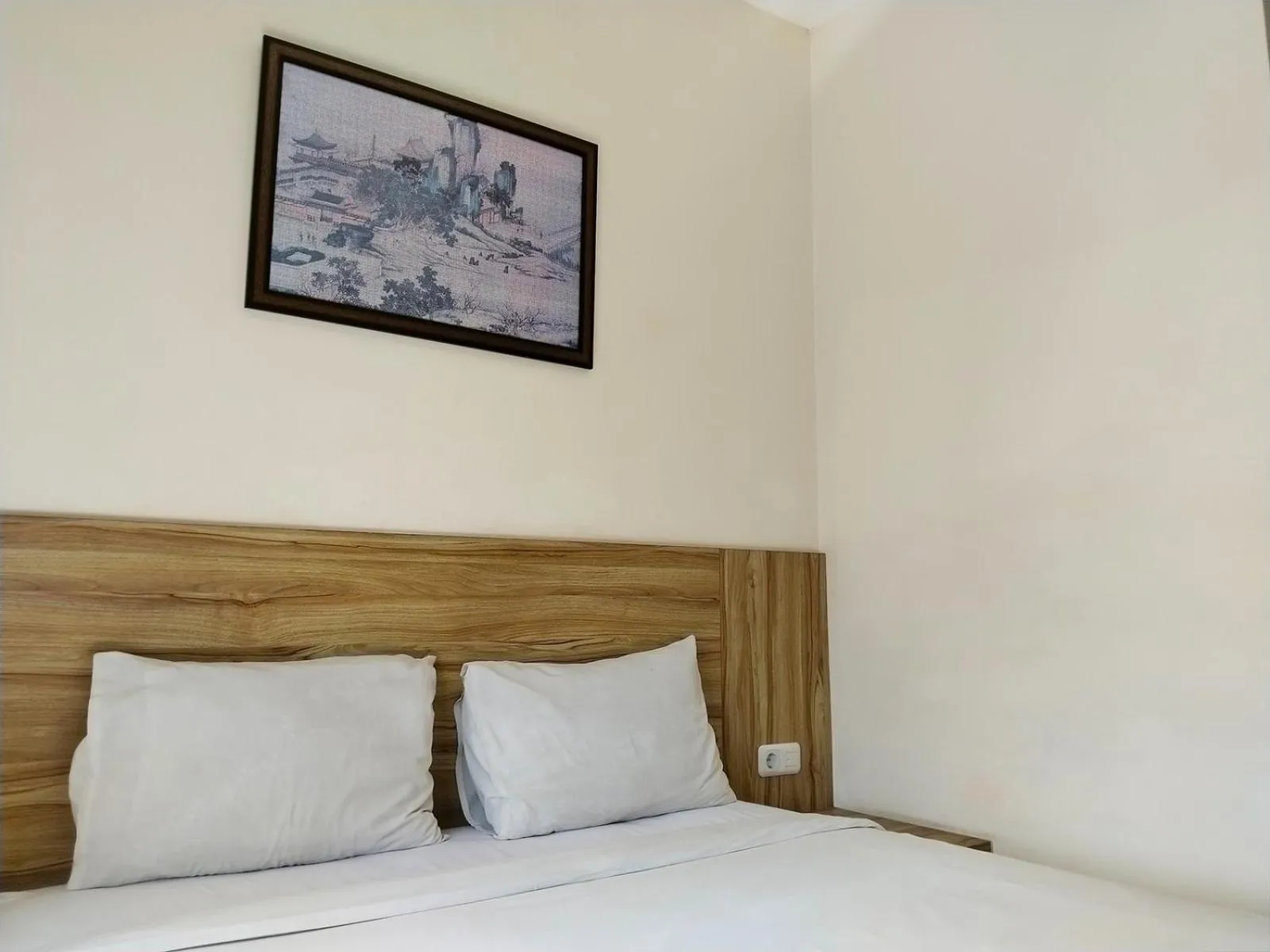 Bed in Portal Residence