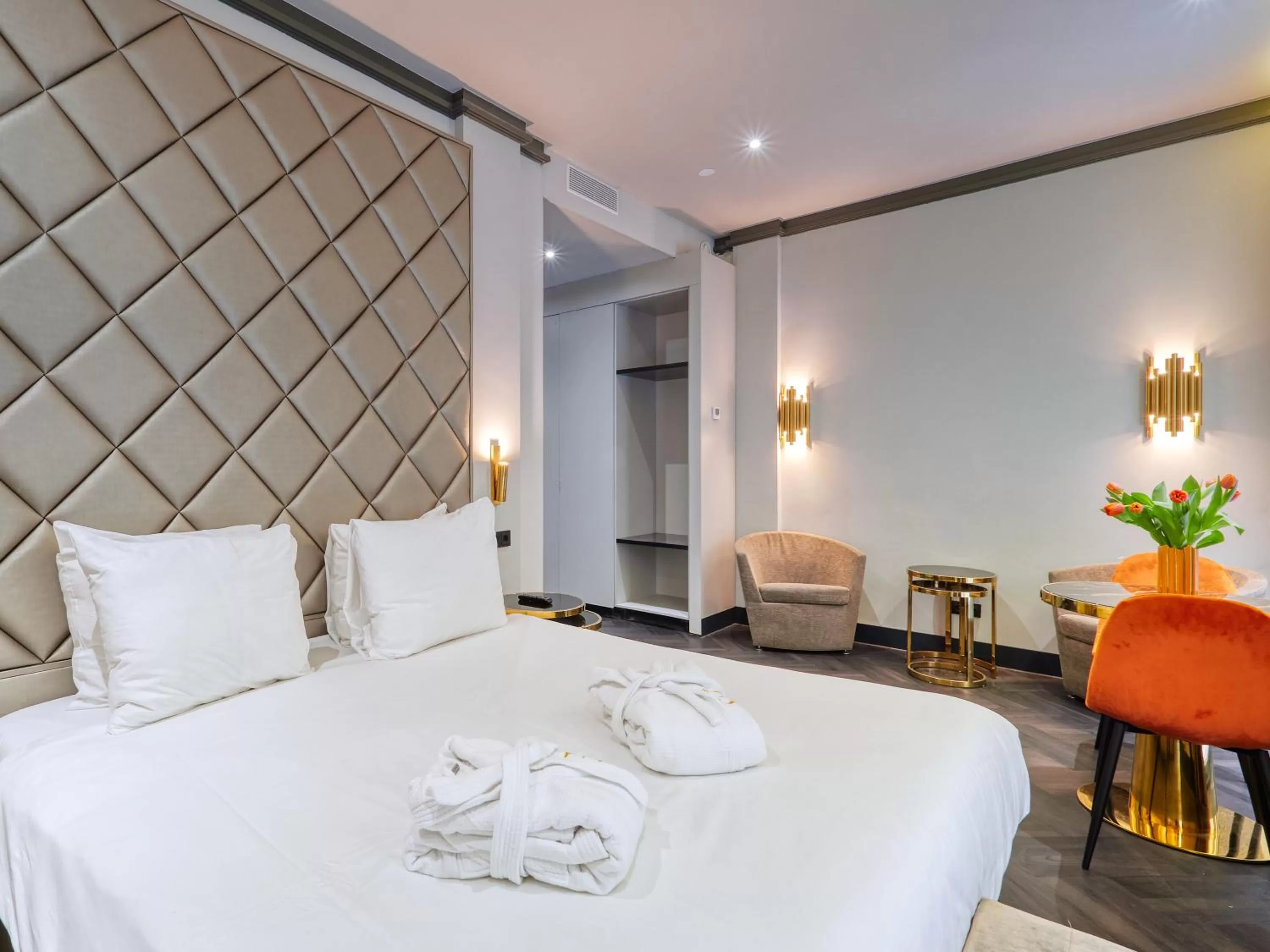 Bed in Triple G Hotels