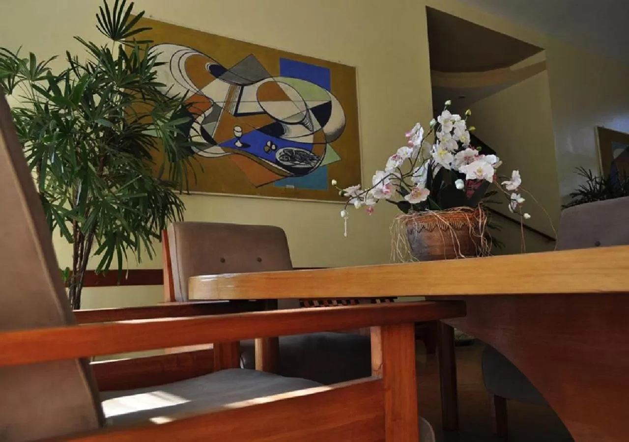 Communal lounge/ TV room, Lobby/Reception in Hotel Cataguases