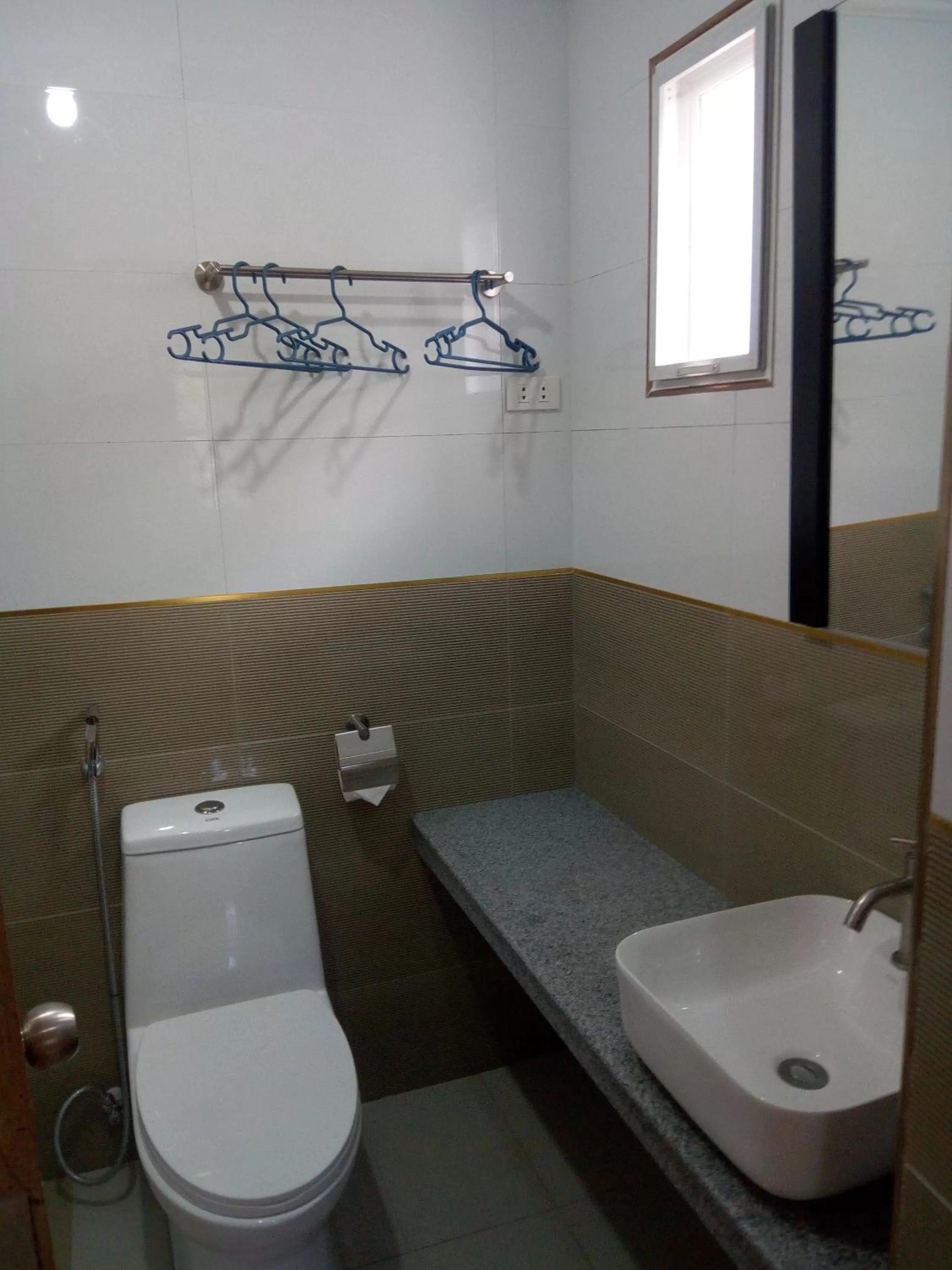 Toilet in Sandscape Hotel