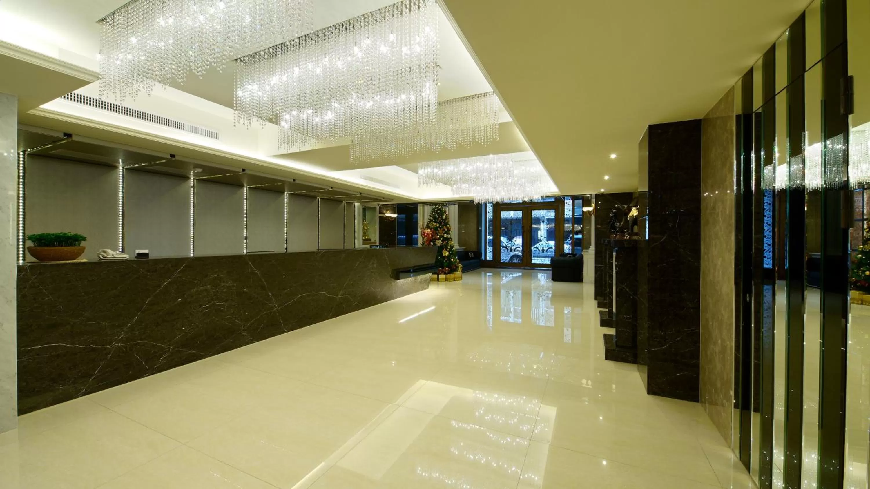 Lobby or reception in Harmonious Hotel