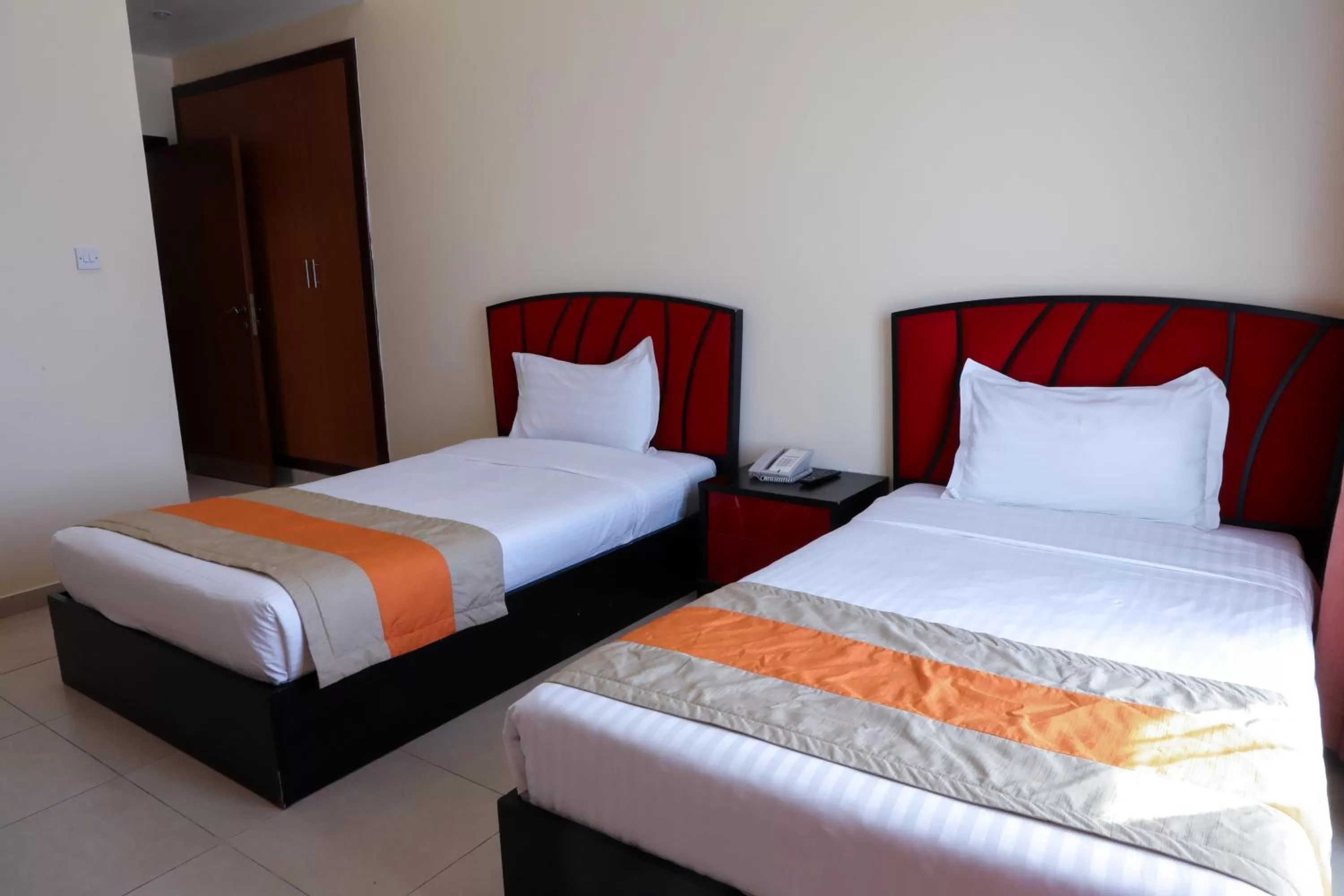 Bed in Wescott Plaza Hotel Apartments LLC Formerly West Zone Plaza Hotel Apts