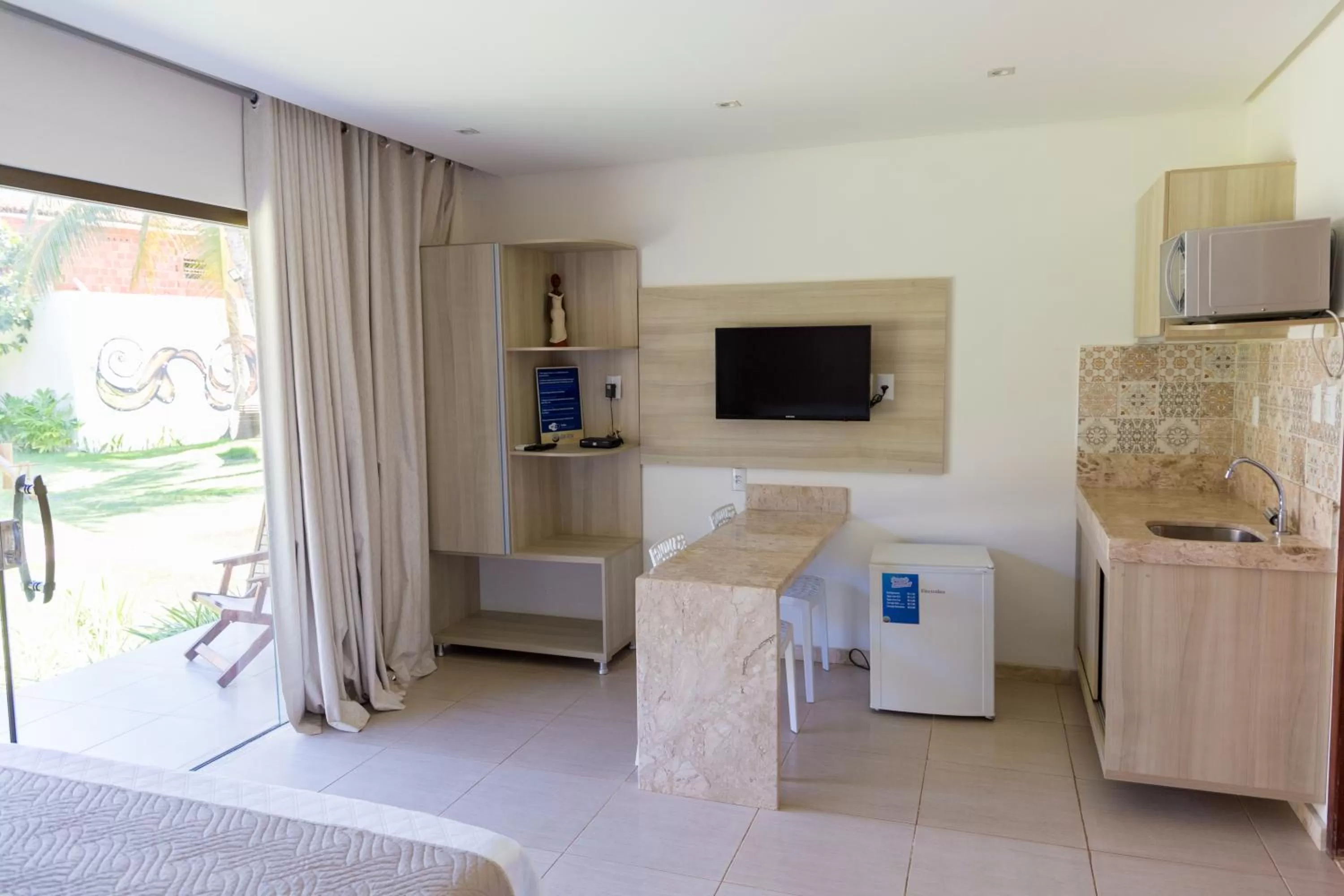 TV/Entertainment Center in Pousada Sol e Mar