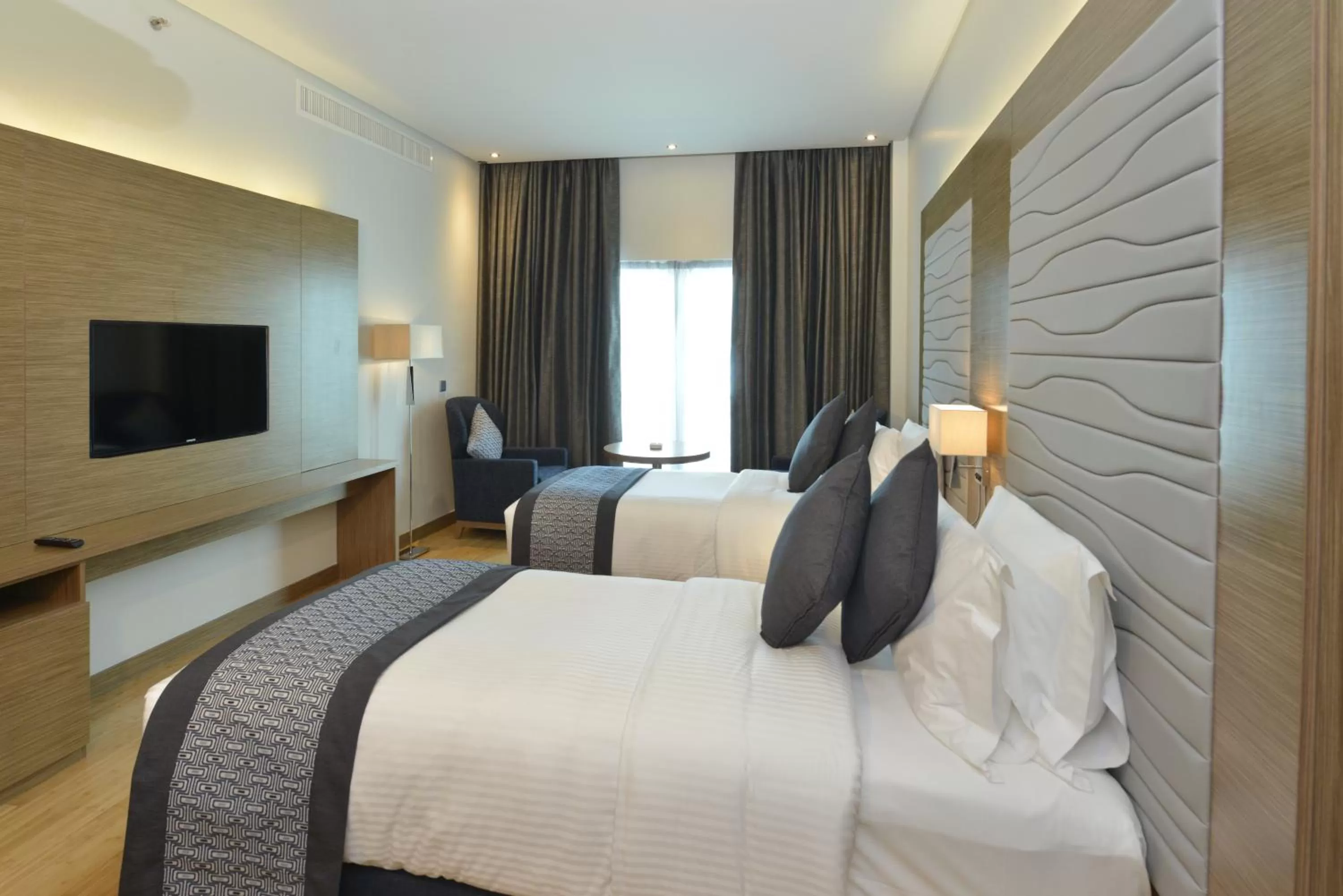 Shower, Bed in Ramada by Wyndham Manama City Centre