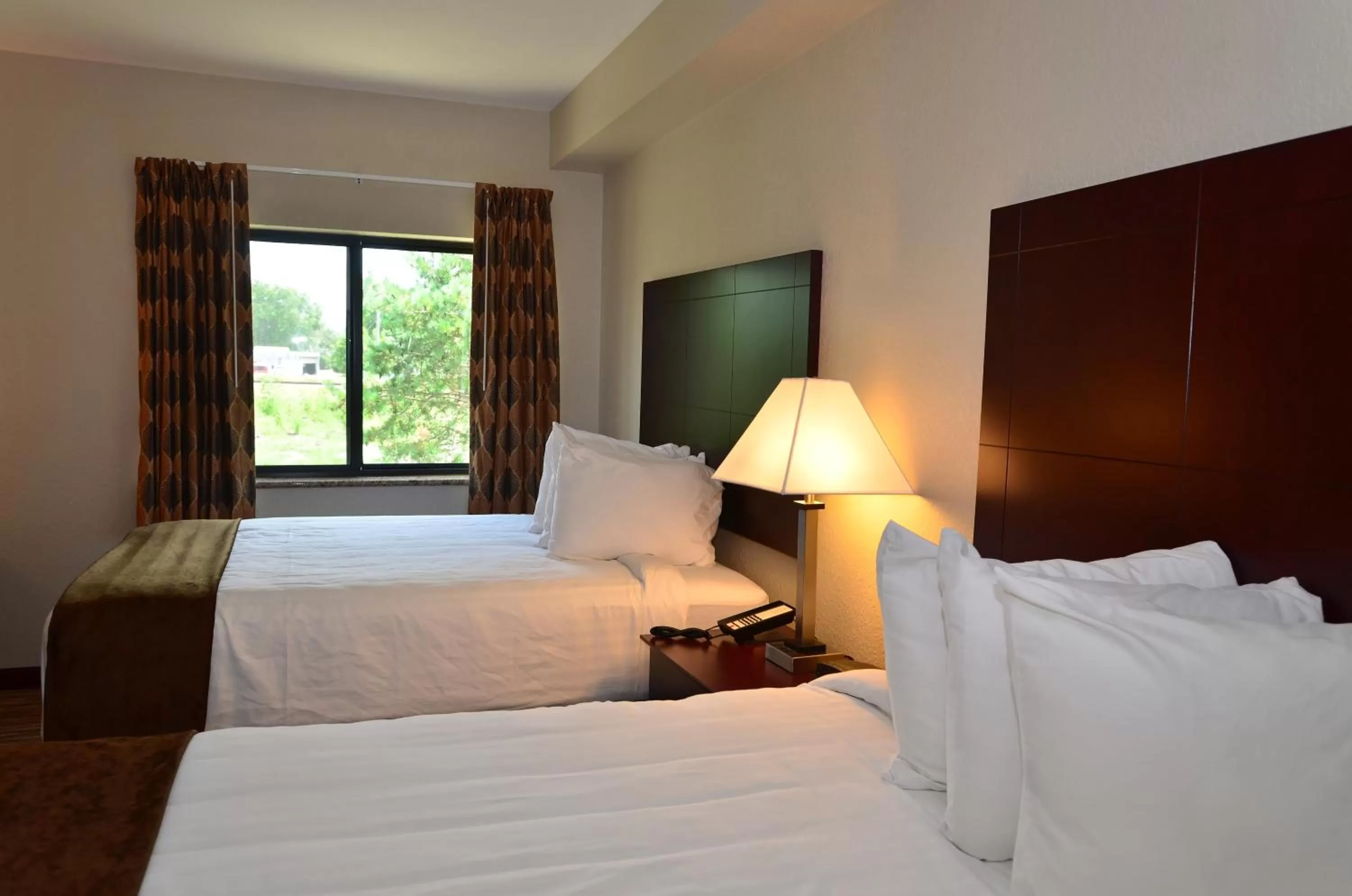 Bed in Cobblestone Inn & Suites - Clarion