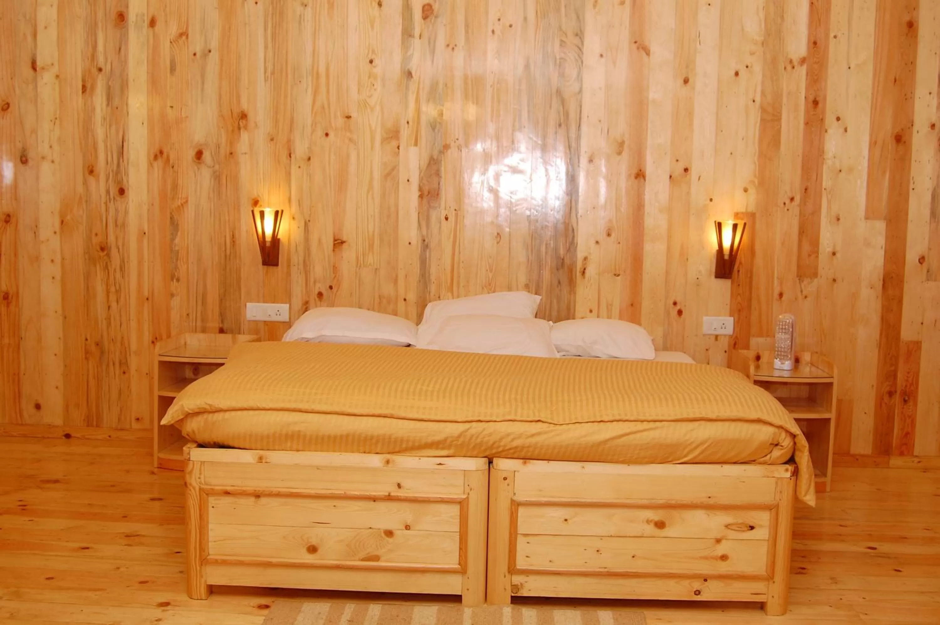 Bed in Surya Holidays Kodaikanal