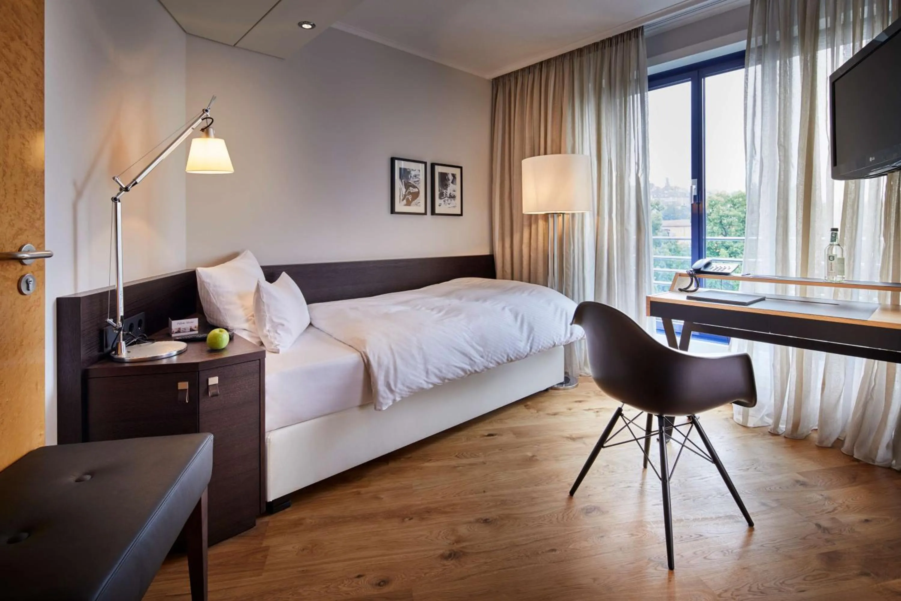 Photo of the whole room, Bed in Parkhotel Pforzheim