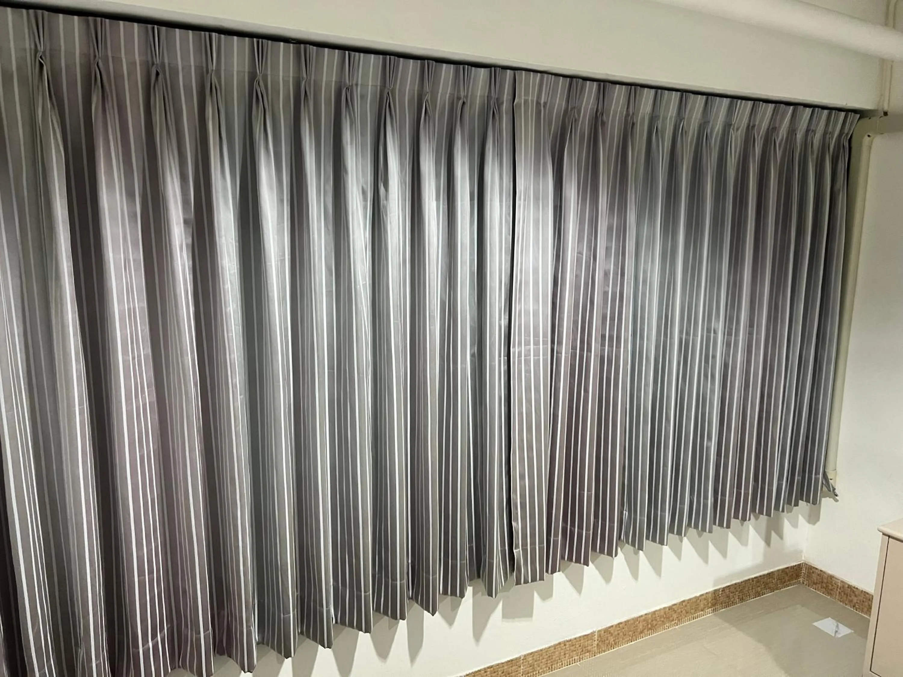 Bedroom in Mall Suites Hotel