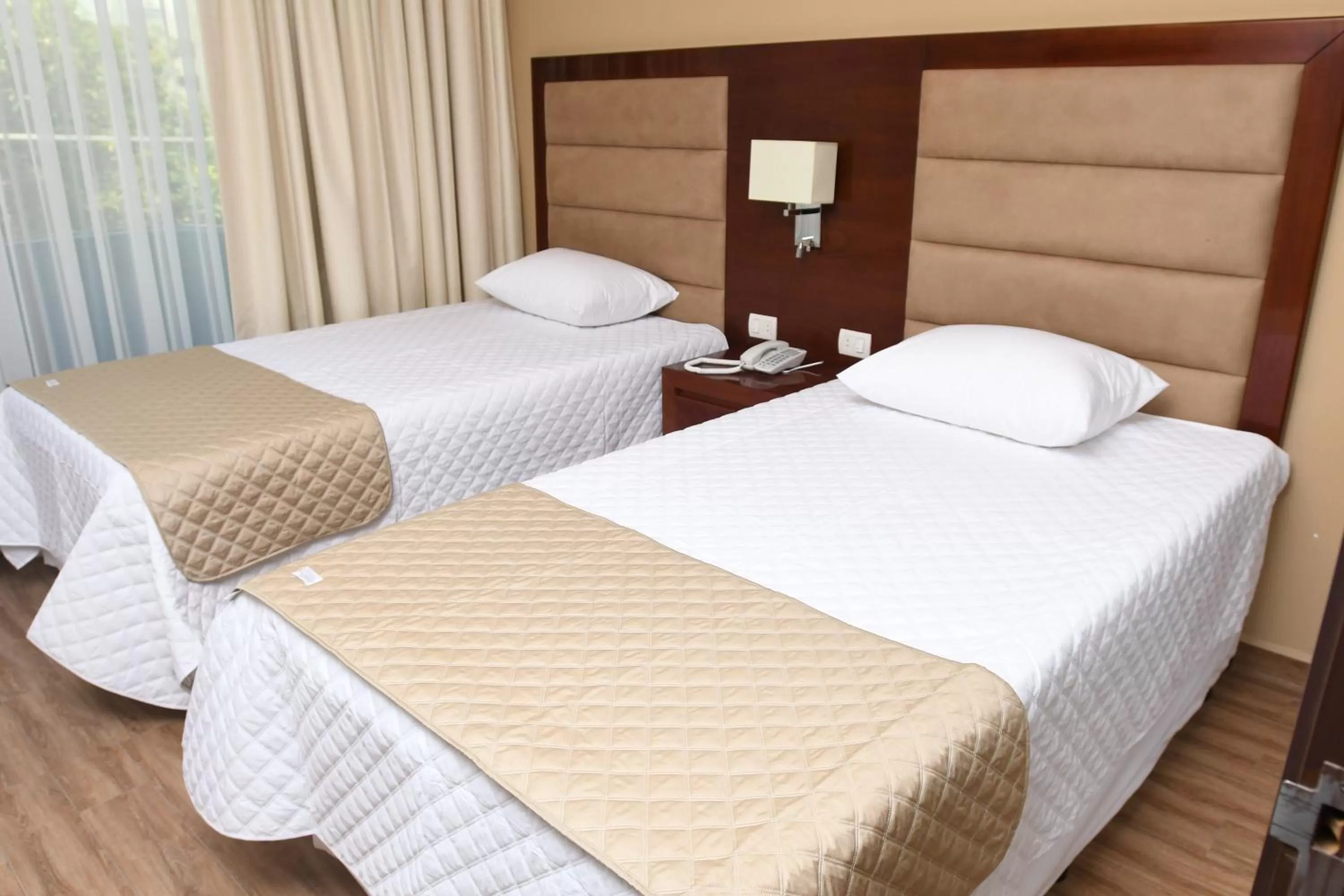 Bed in Taos Apart Hotel