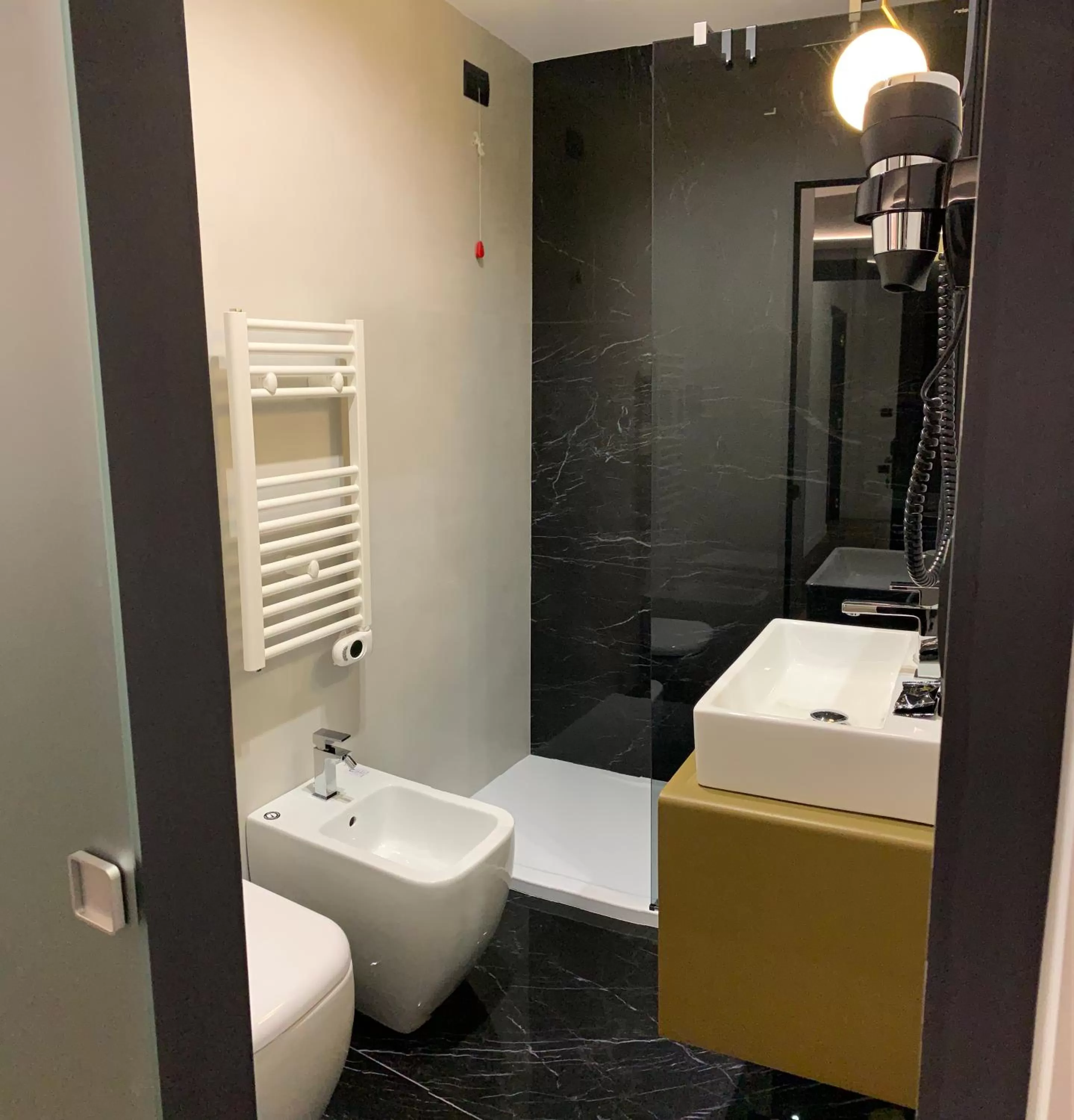 Bathroom in Toledo Boutique Rooms