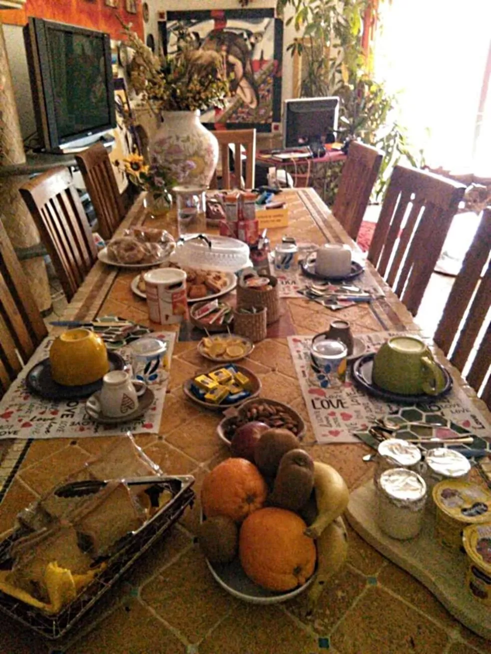 Communal lounge/ TV room in Casa d' Artista B&B