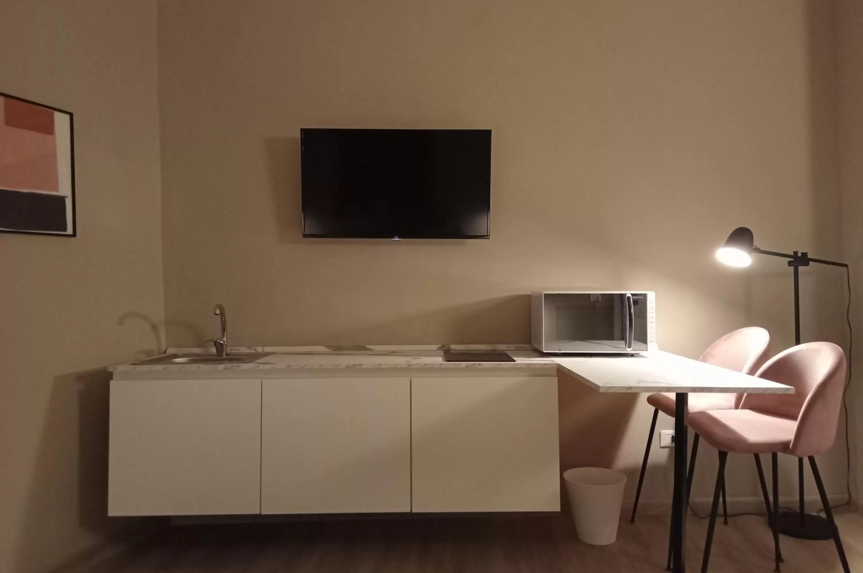 TV and multimedia, TV/Entertainment Center in Narciso boutique apartment