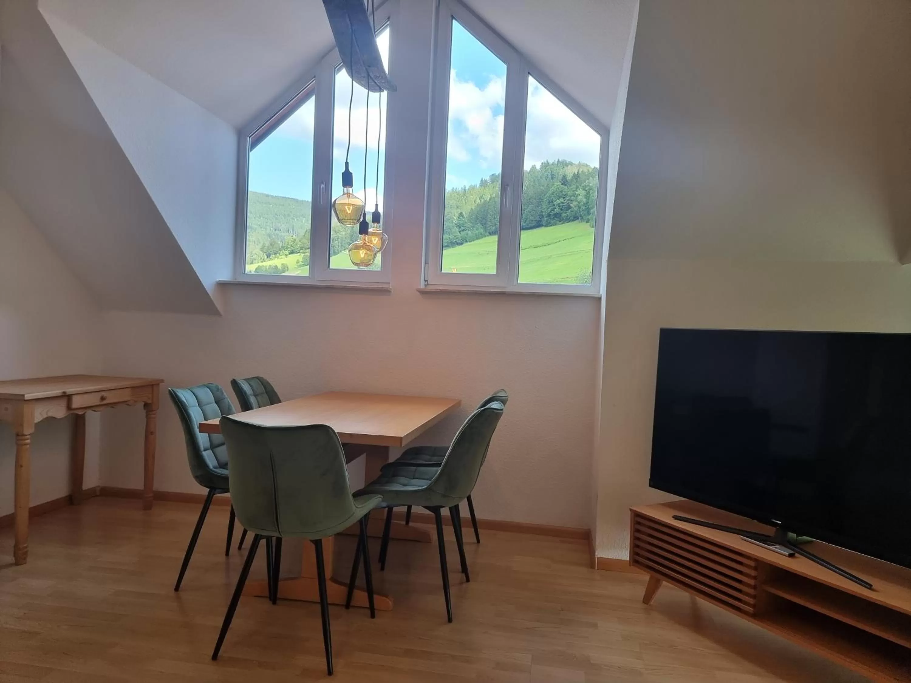 Communal lounge/ TV room in Kurparkhotel Faißt