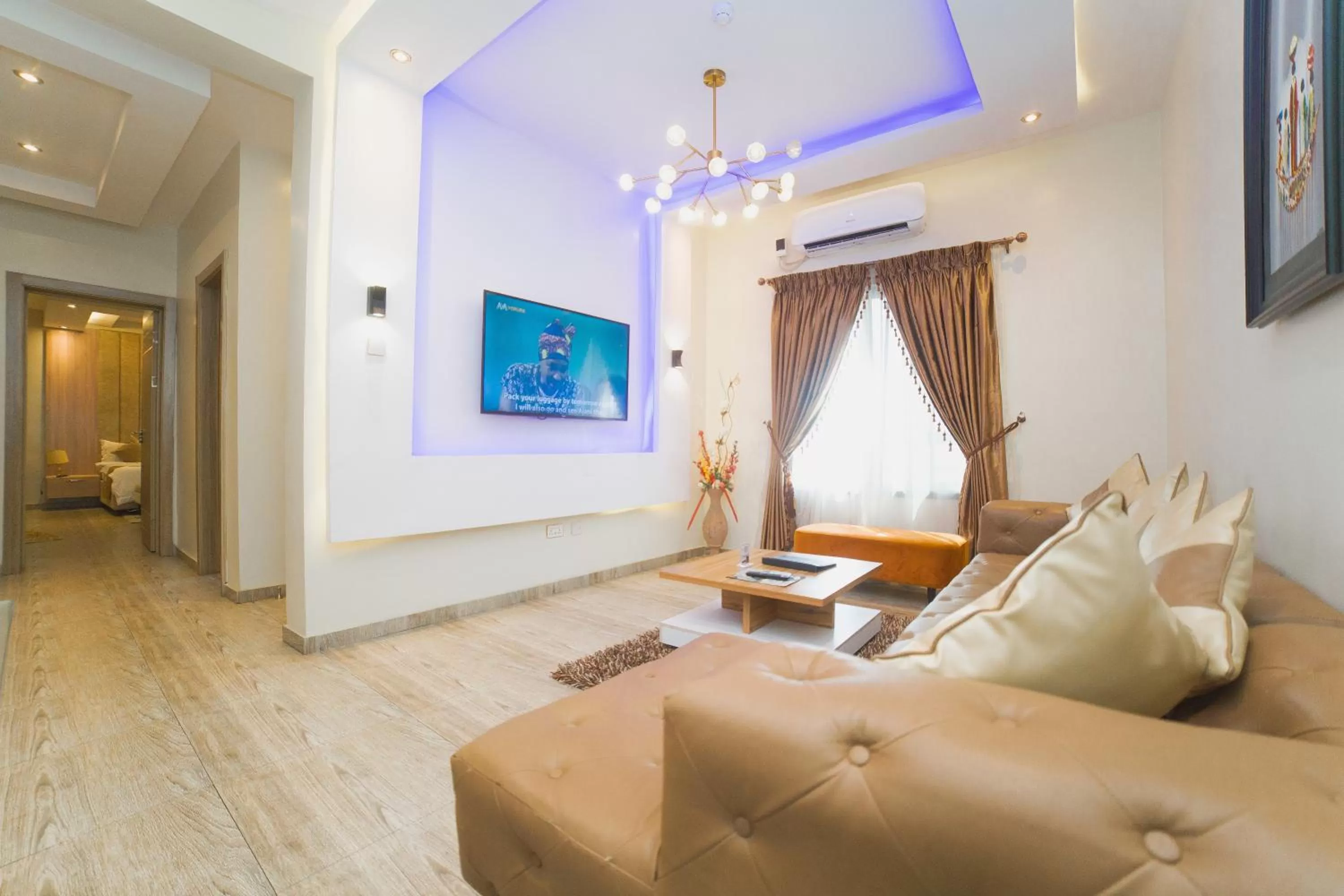 Communal lounge/ TV room in God's Touch Apartments Signature