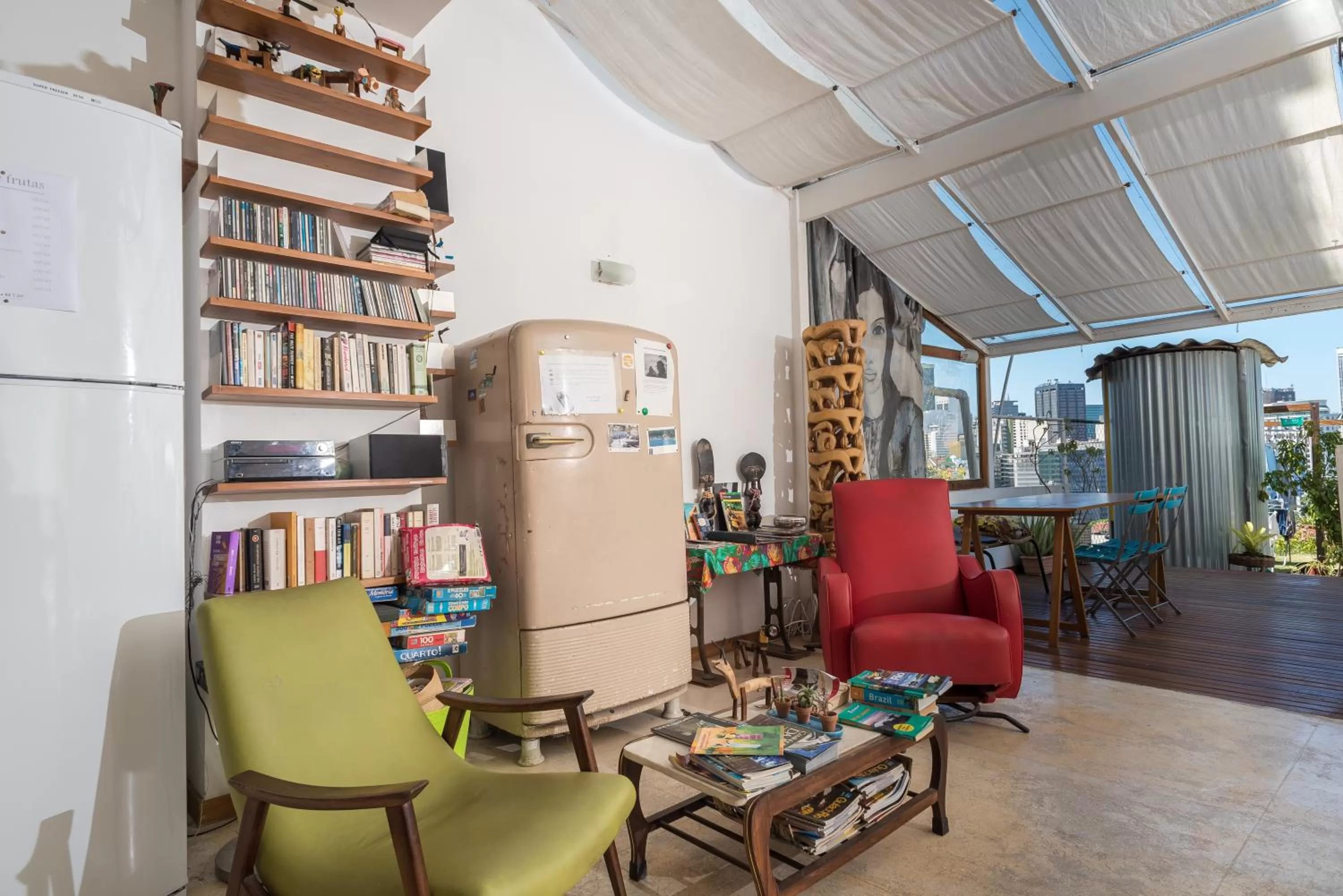 Communal lounge/ TV room in Casa da Gente