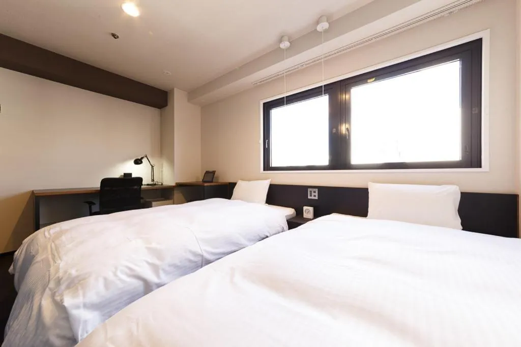 Photo of the whole room, Bed in Hotel Citio Shizuoka