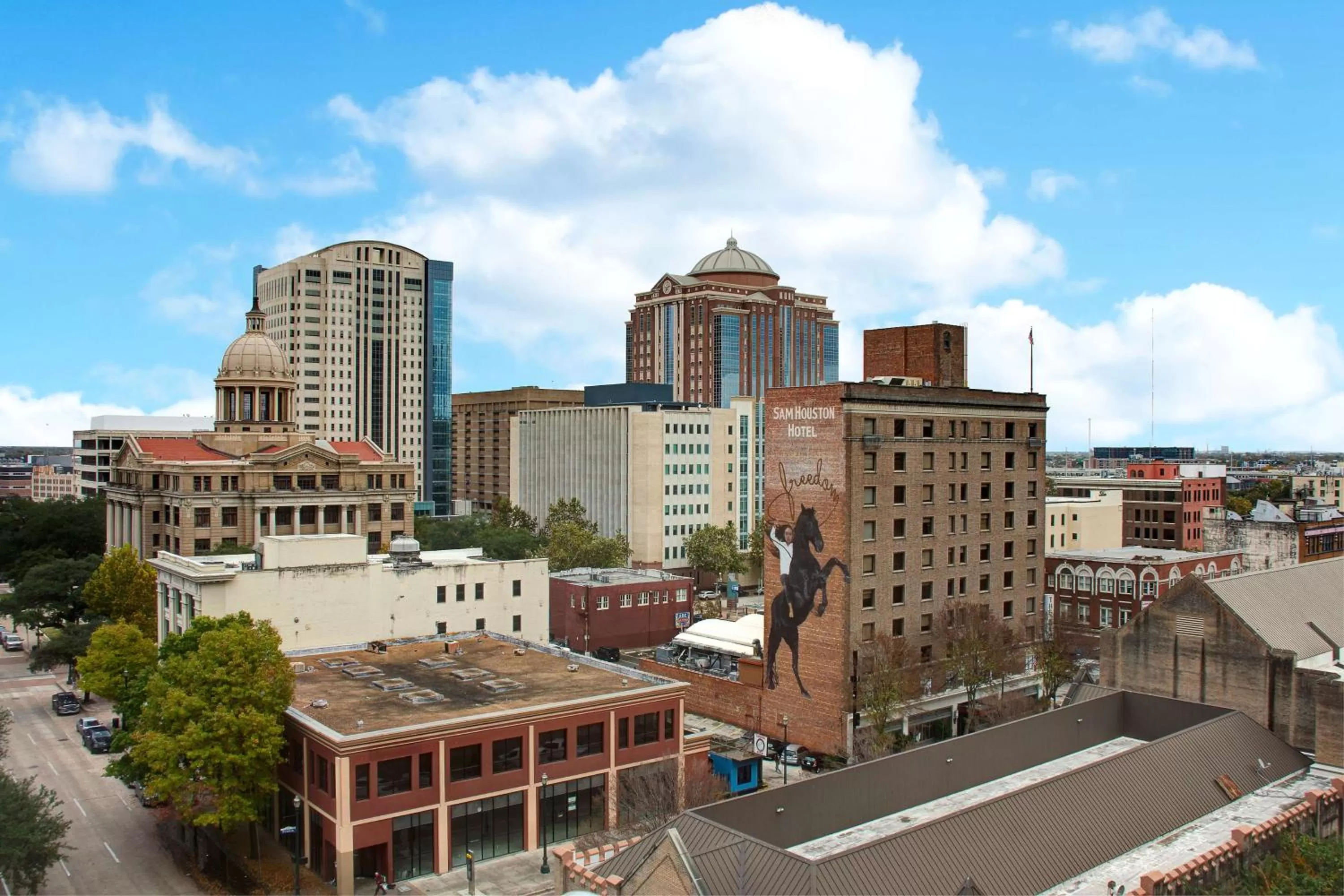Property building in The Sam Houston, Tapestry Collection by Hilton