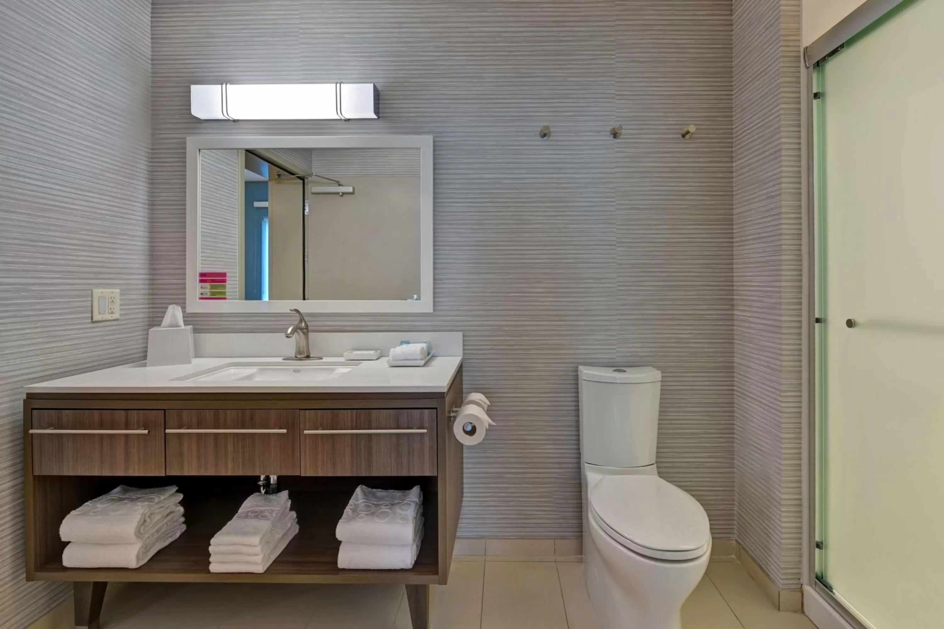 Bathroom in Home2 Suites By Hilton West Palm Beach Airport