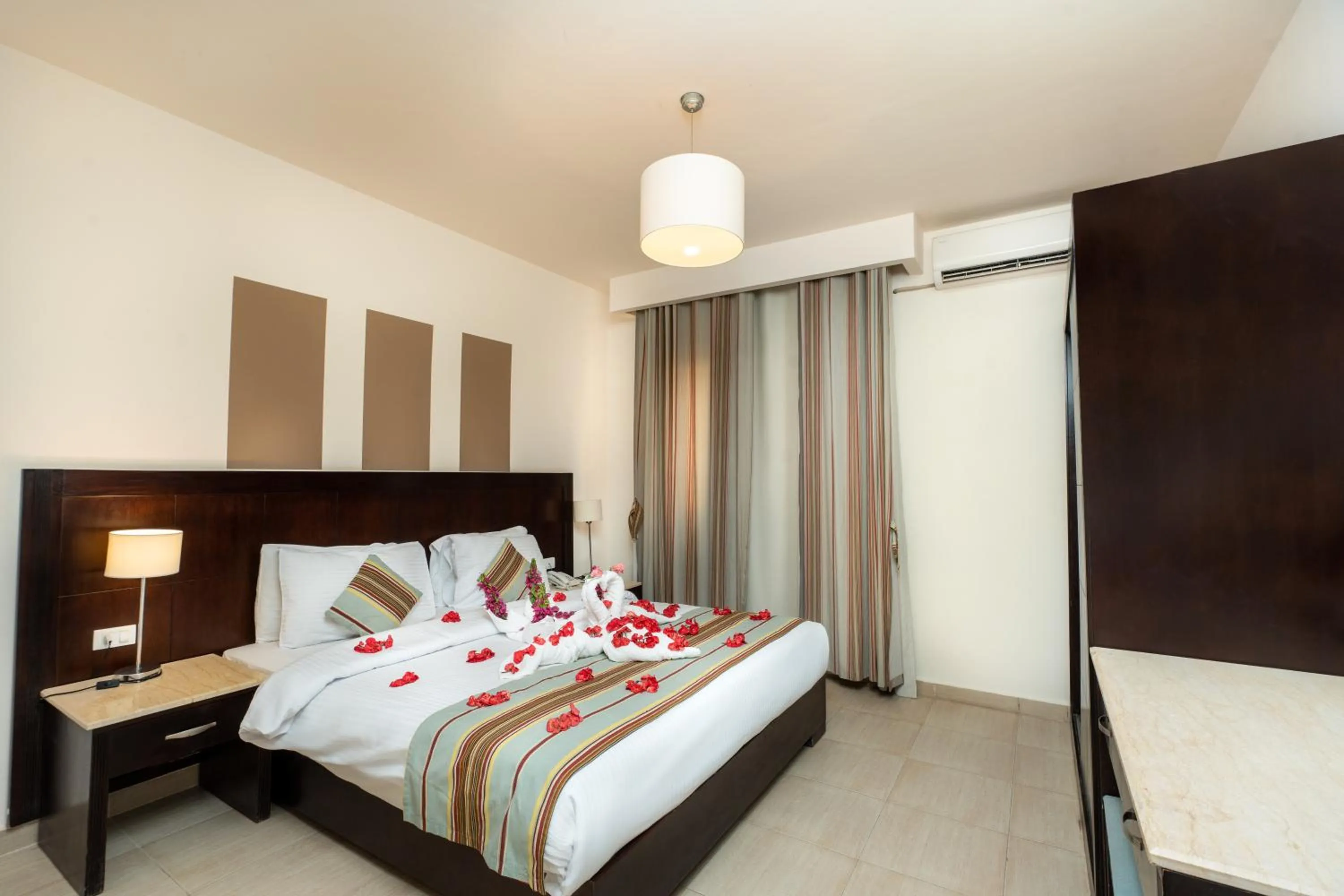 Bedroom, Bed in El Karma Beach Resort & Aqua Park - Hurghada