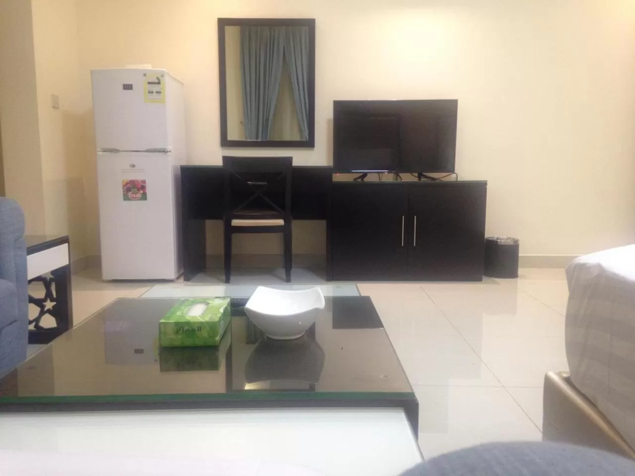 TV/Entertainment Center in Arjaan Altakhassusi Hotel Suites