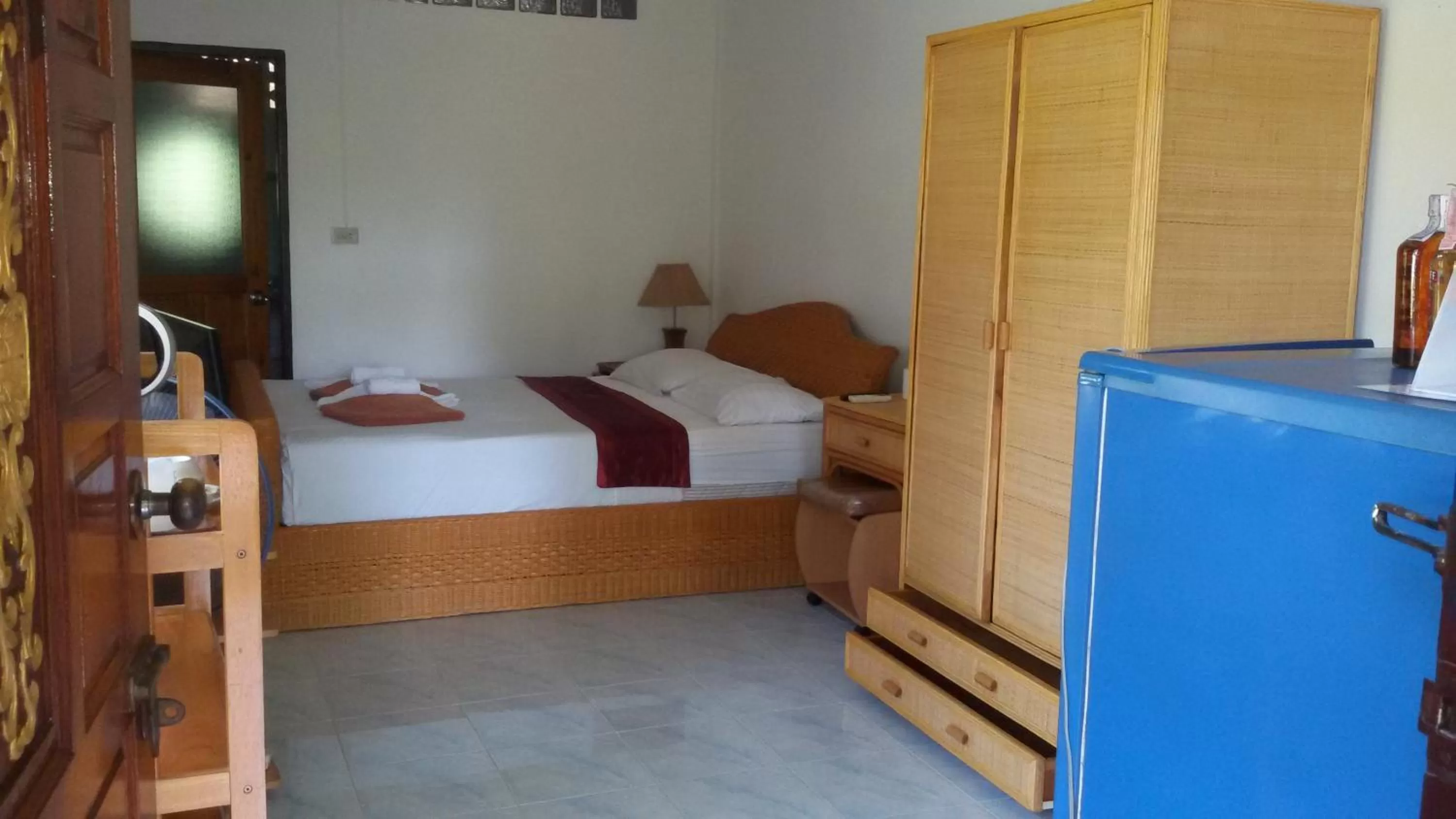 Bed in Jungle Village Bungalow