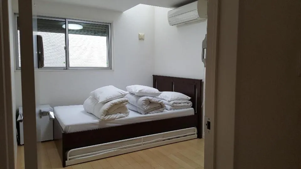Bed in Sophiearth Apartment