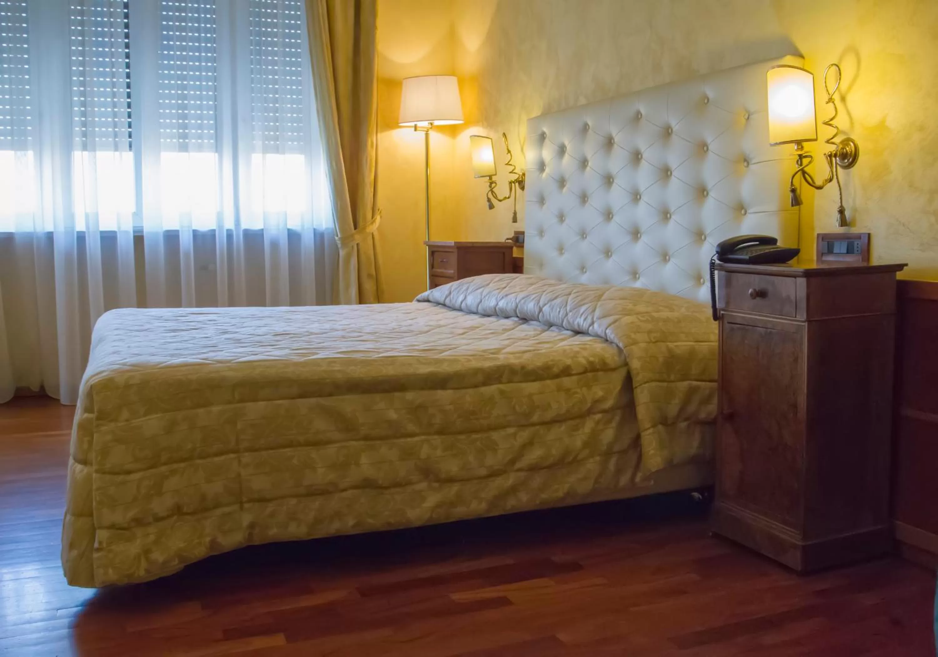 Bed in Hotel Continental