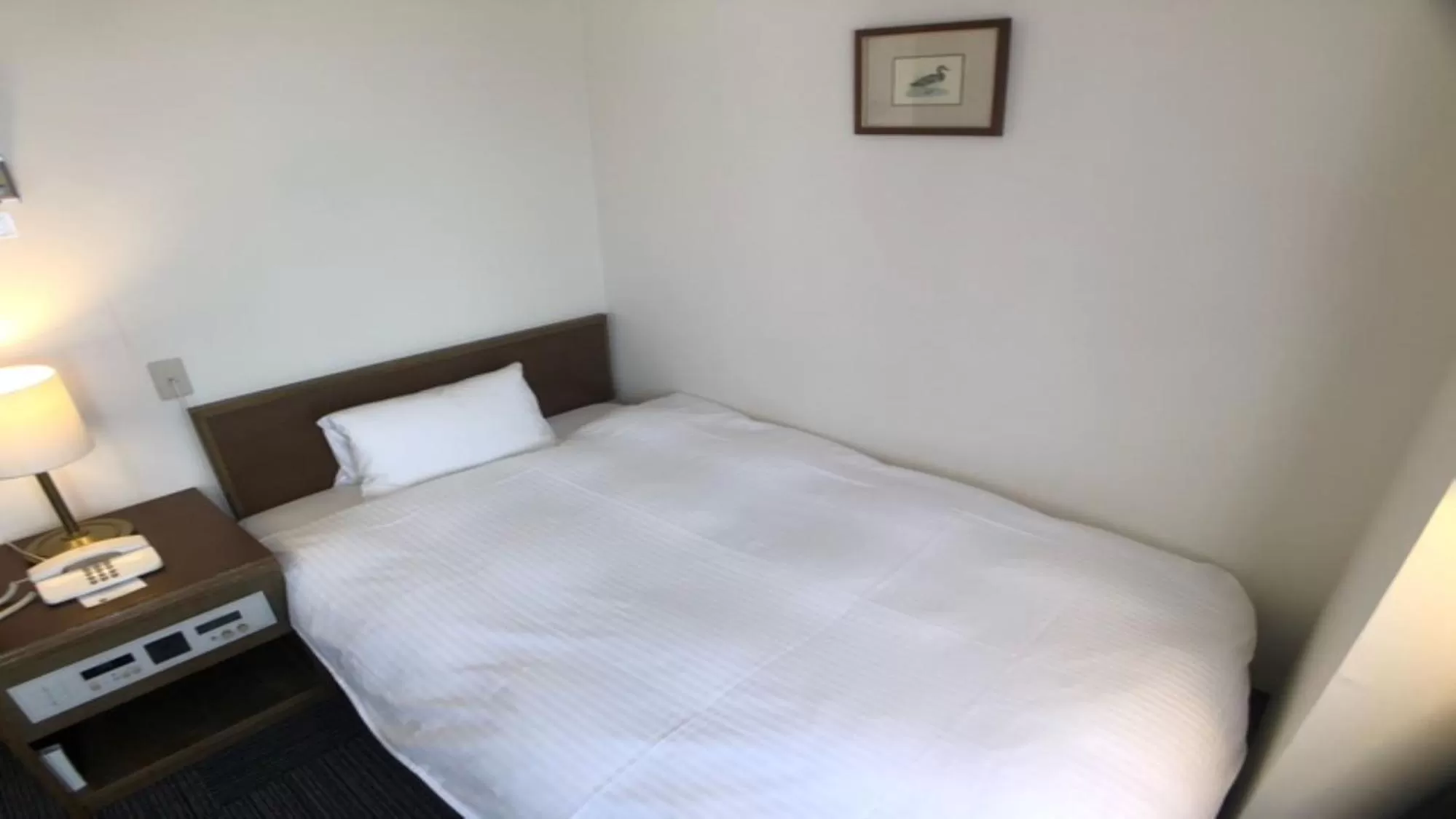 Bed in 小牧シティホテル