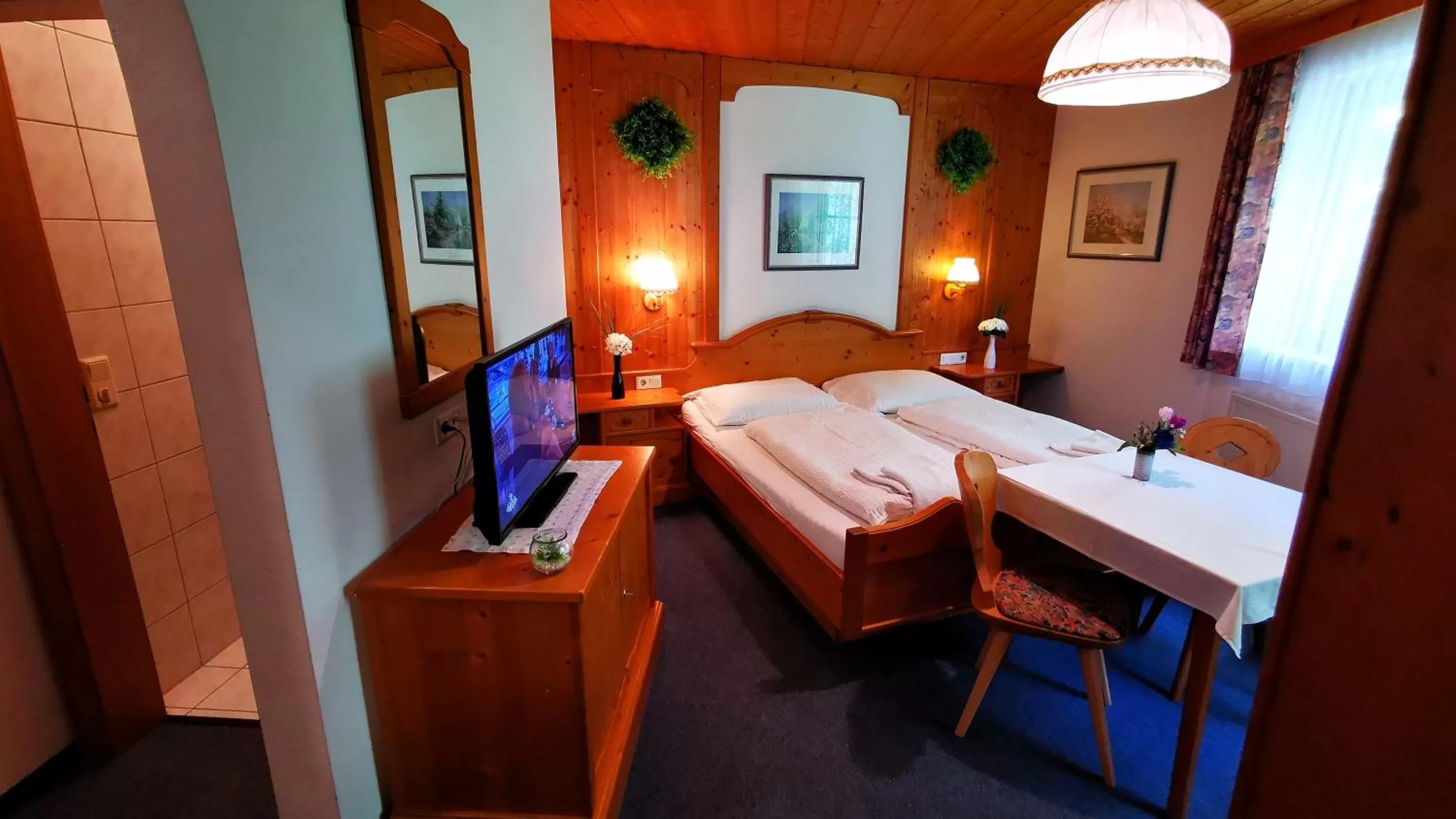 Photo of the whole room, Bed in Gasthof Geronimo