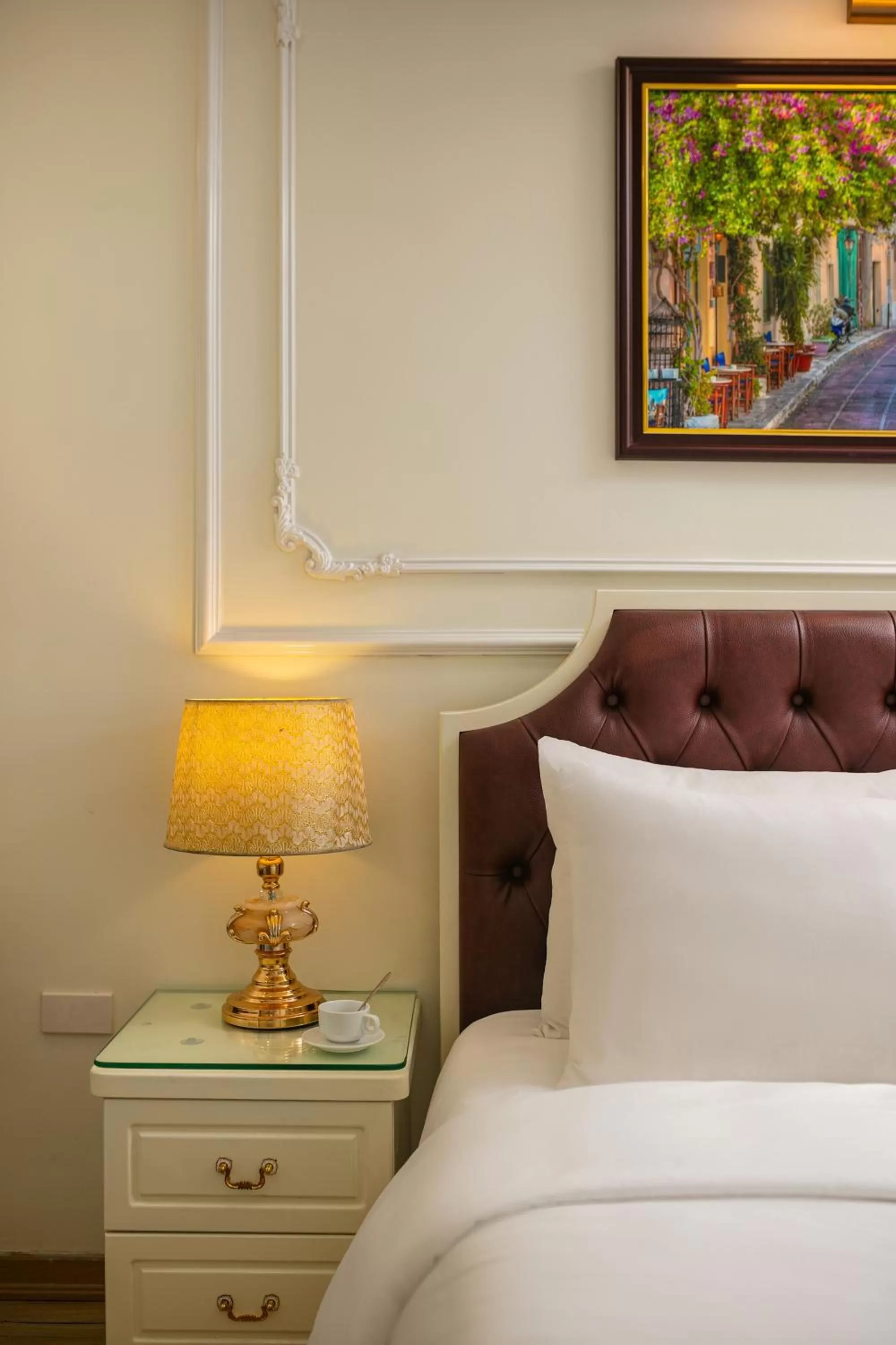 Bed in Tunger Grand Hotel