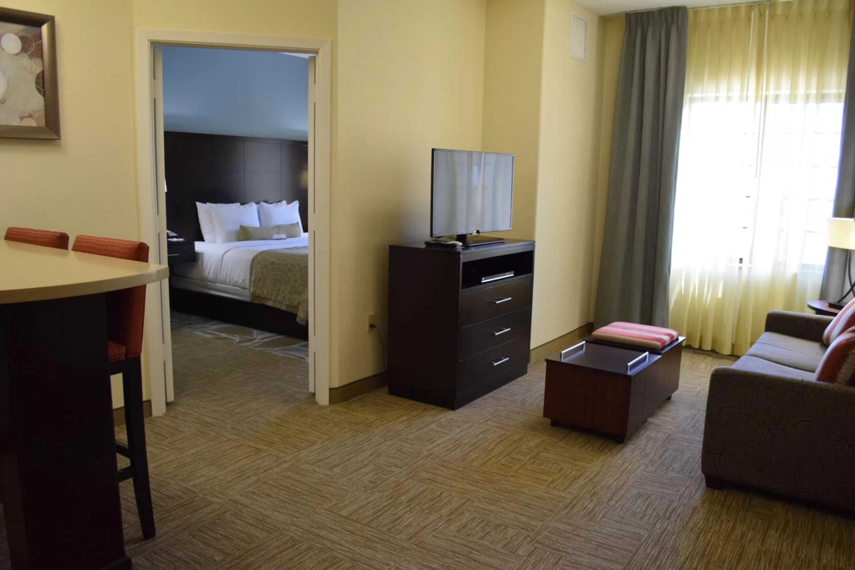 Photo of the whole room, Bed in Staybridge Suites Houston Stafford - Sugar Land by IHG