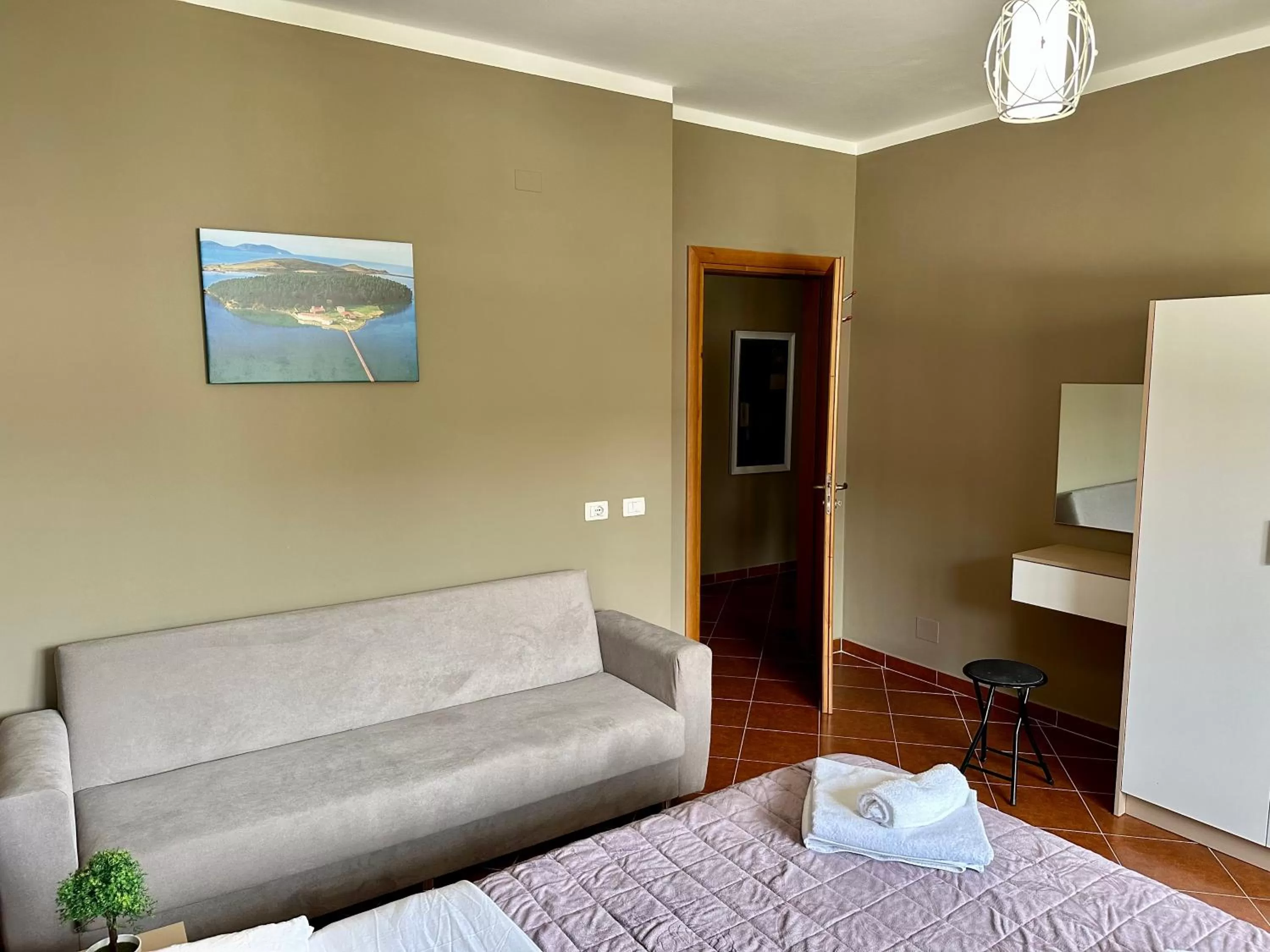 Bed, Seating Area in FAMILY SUITE RESIDENCE