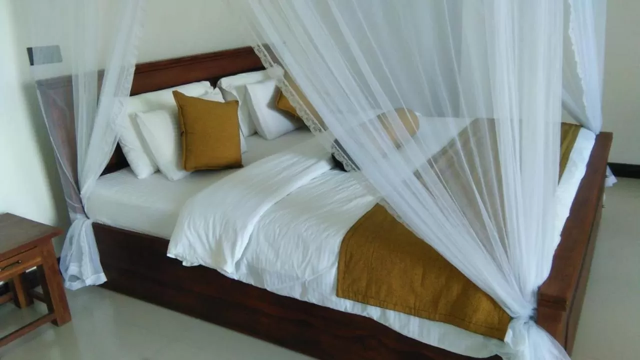 Bed in Maple Home Stay