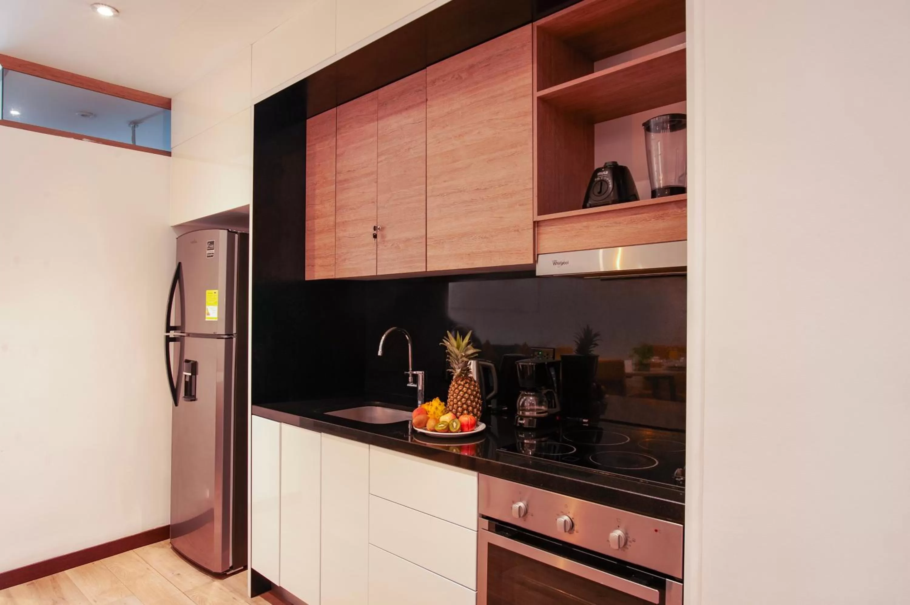 Kitchen or kitchenette in Hemma Bogotá Country Luxury Suites Hotel