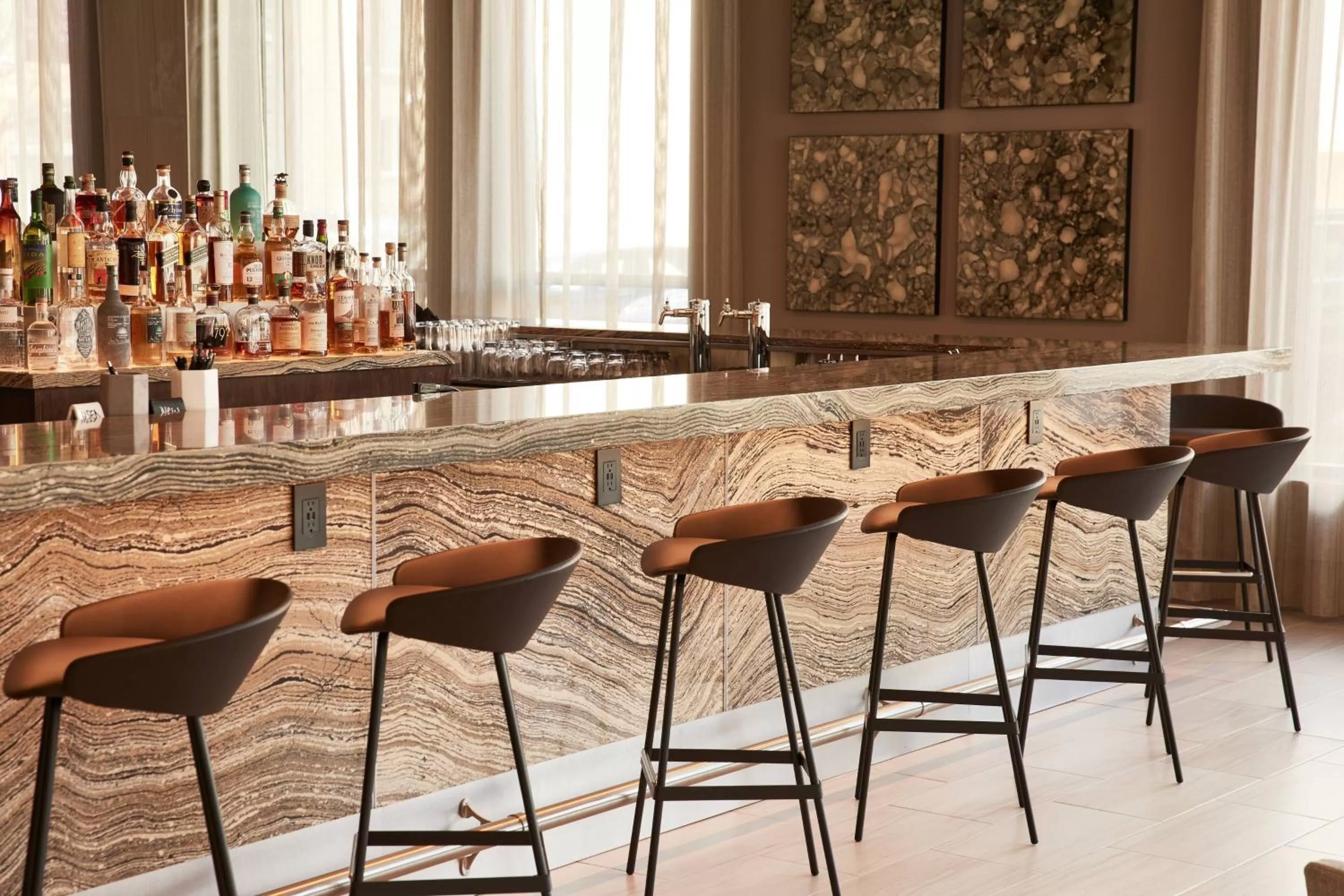 Lounge or bar in AC Hotel by Marriott Missoula Downtown