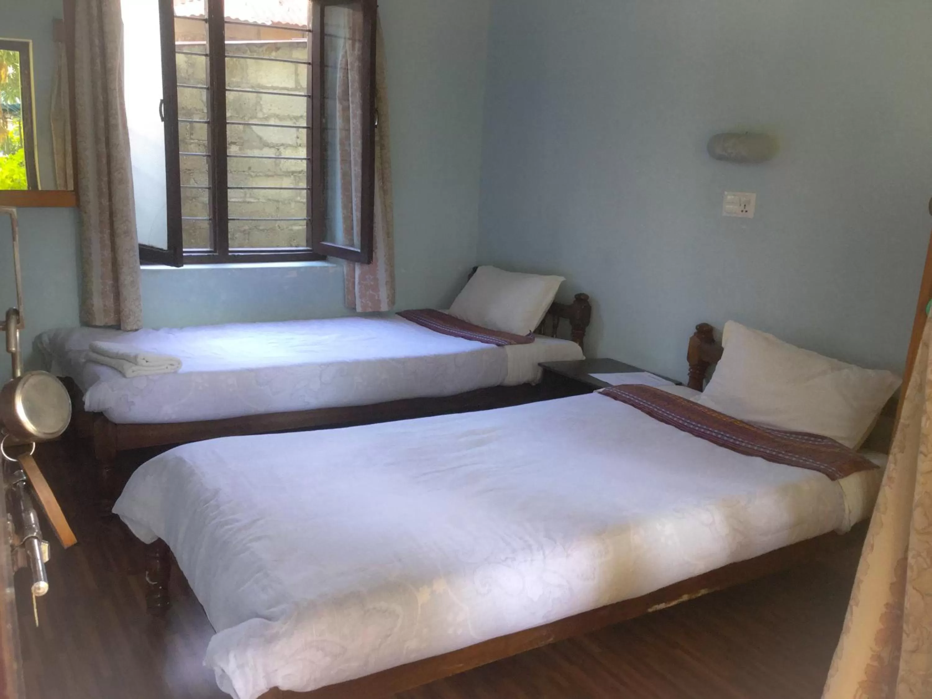 Bed in Yeti Guest House