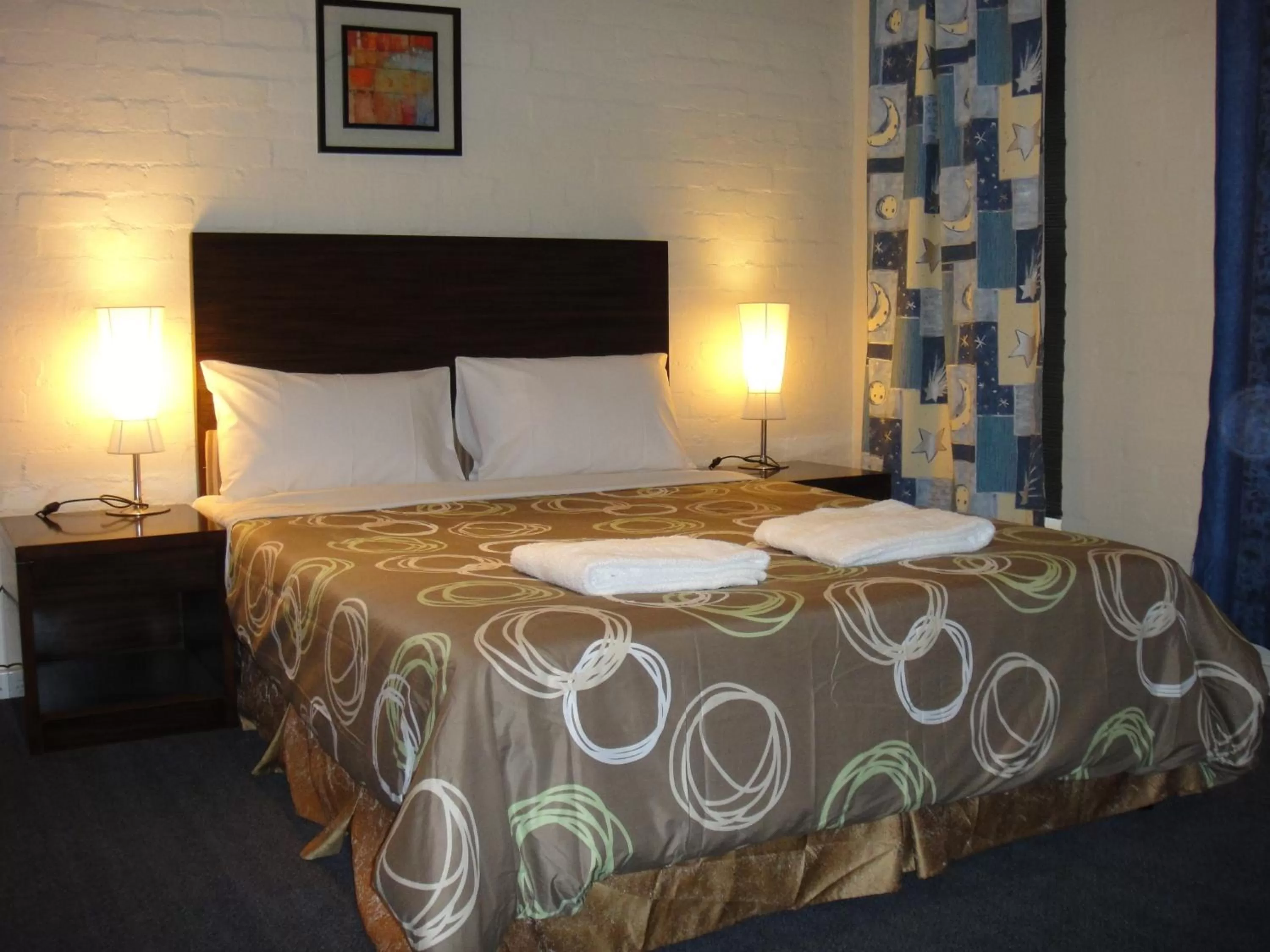 Bed in YTI Garden Hotel